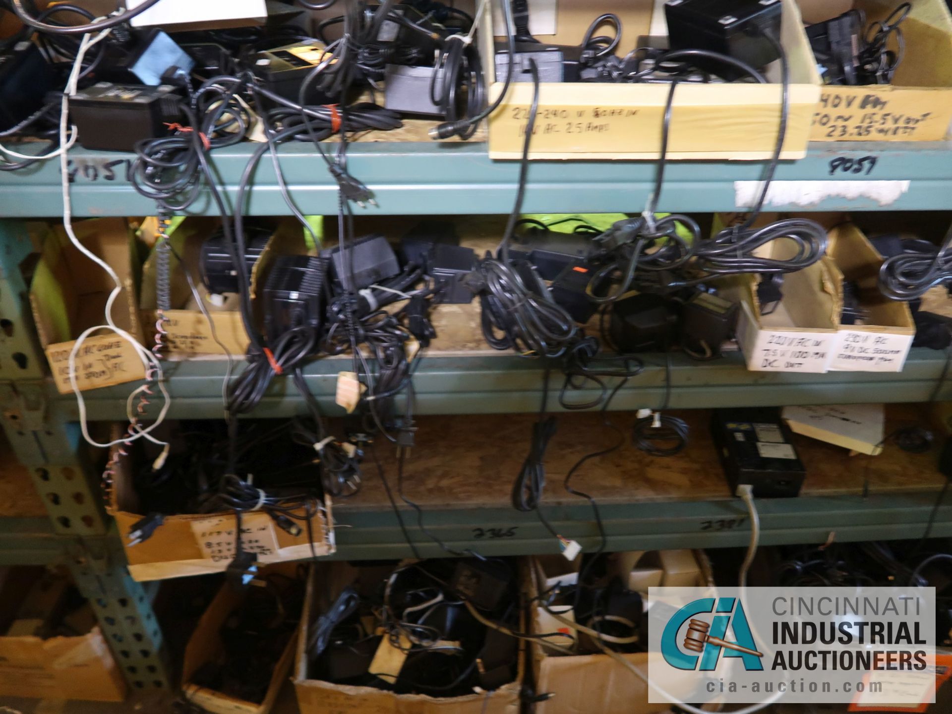 CONTENTS OF (5) RACKS INCLUDING MISCELLANEOUS POWER CORDS, BATTERY CHARGERS **NO RACKS** - Image 10 of 21