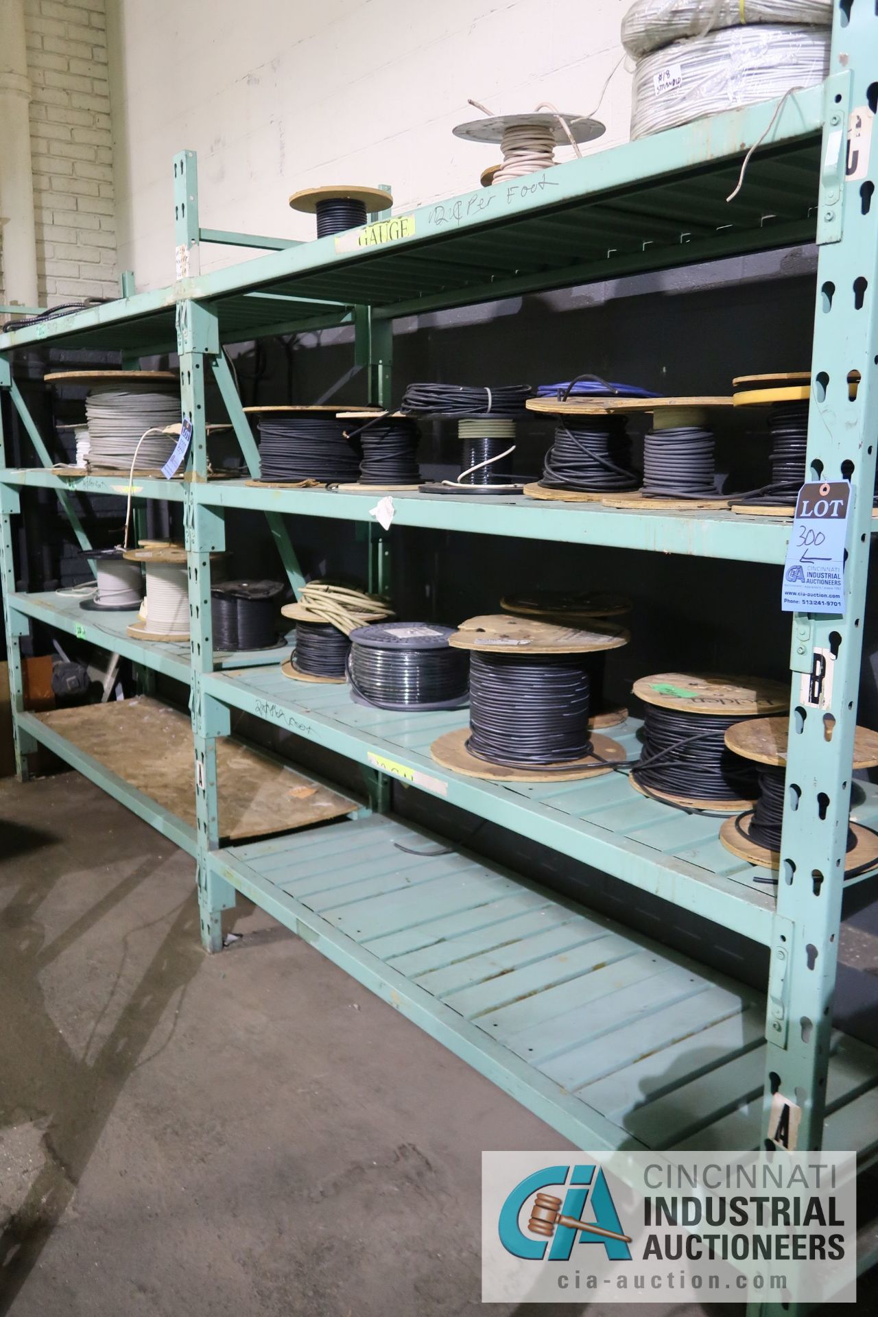 (LOT) VARIOUS SIZE LIGHT DUTY COMPUTER AND SPEAKER CABLE ON (2) SECTIONS RACK - APPROX. (25) SPOOLS