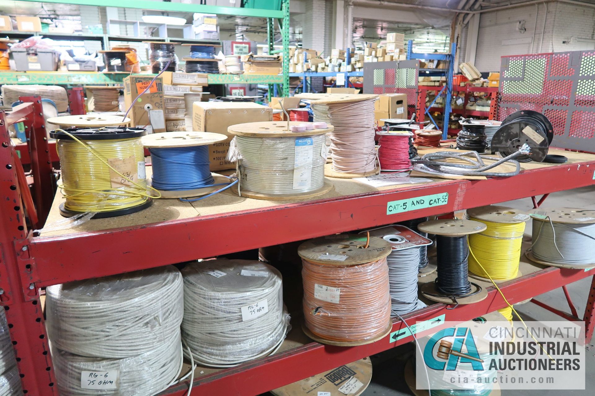 (LOT) LARGE QUANTITY OF COAX CABLE ON (3) SECTIONS RED RACK - APPROX. (130) SPOOLS - SOLD BY THE - Image 10 of 14