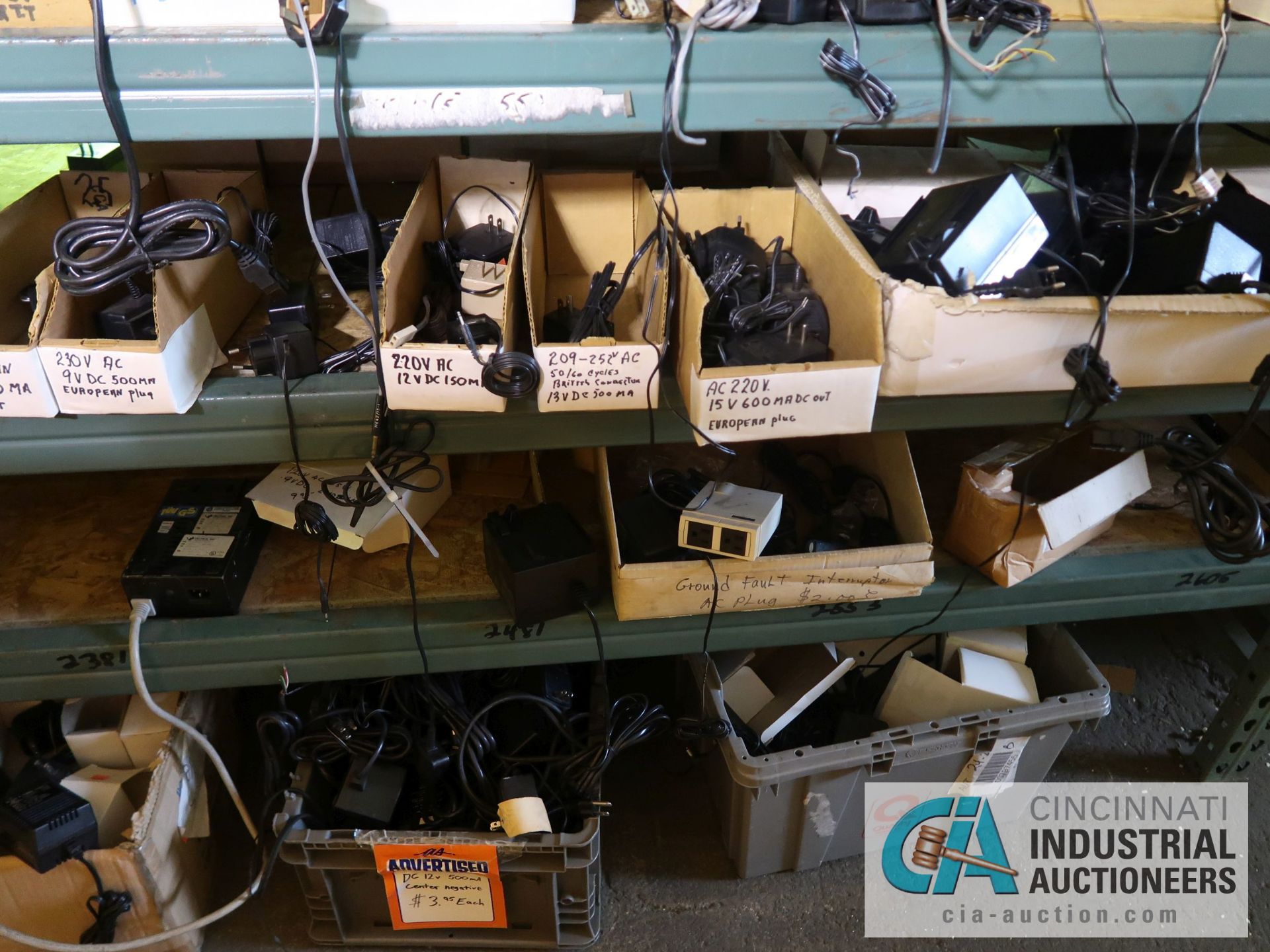 CONTENTS OF (5) RACKS INCLUDING MISCELLANEOUS POWER CORDS, BATTERY CHARGERS **NO RACKS** - Image 9 of 21