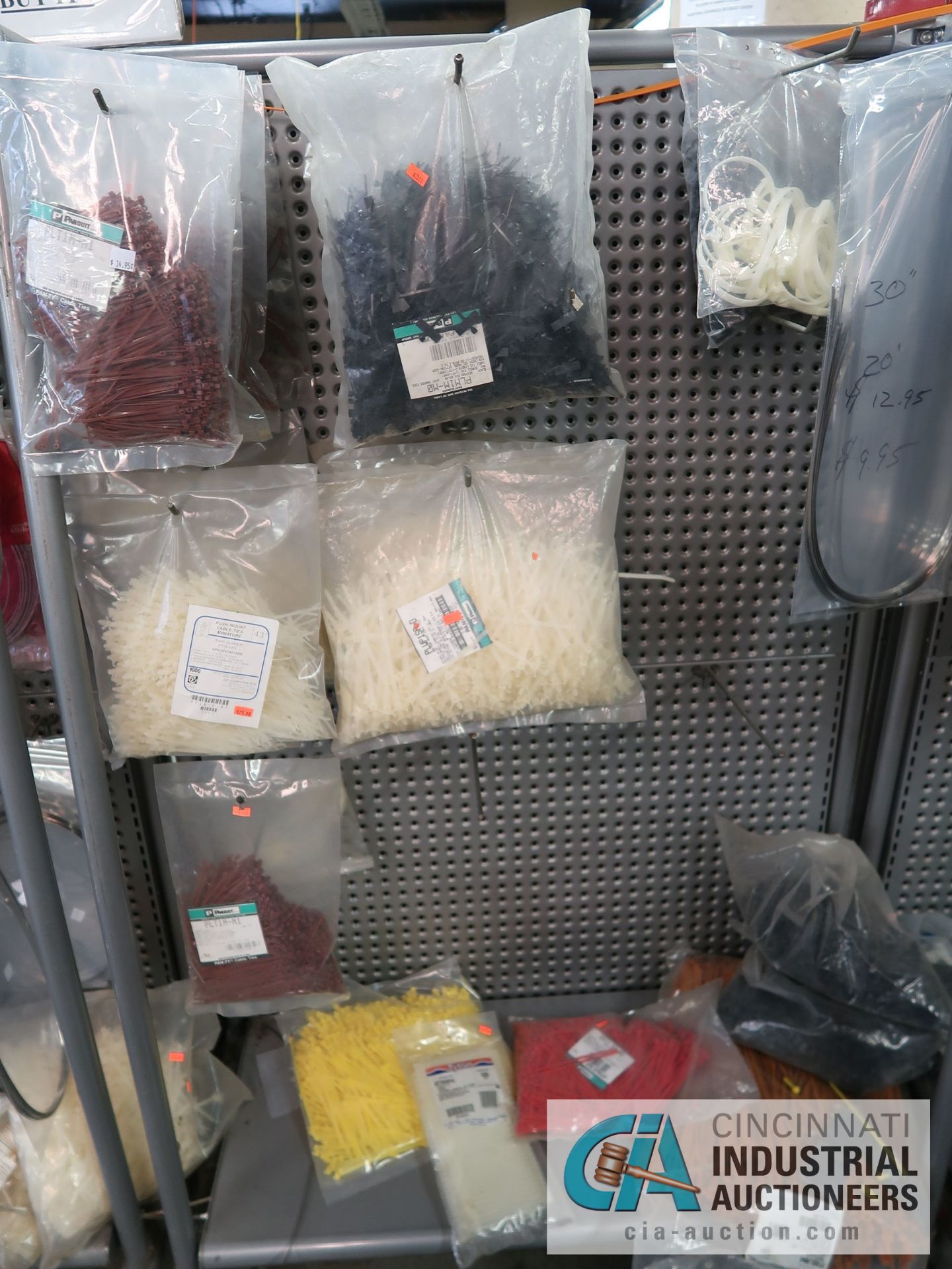 CONTENTS OF (11) DISPLAY RACKS INCLUDING CABLE TIES, STEEL CLAMPS, BATTERIES, HORN SPEAKERS, TV WALL - Image 10 of 13