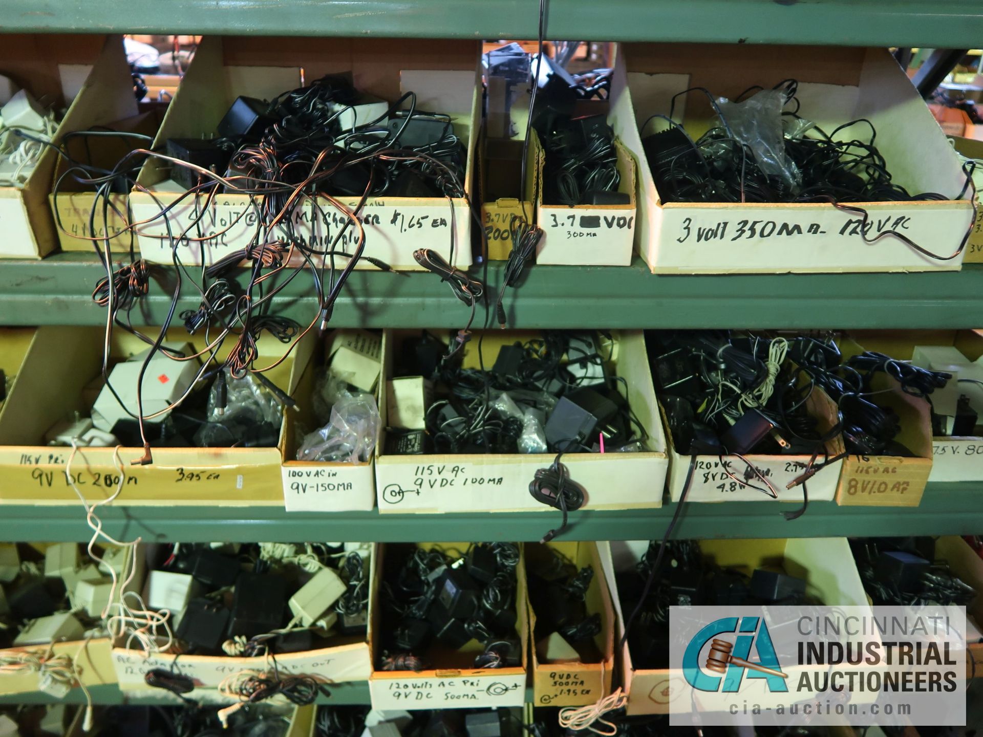 CONTENTS OF (5) RACKS INCLUDING MISCELLANEOUS POWER CORDS, BATTERY CHARGERS **NO RACKS** - Image 14 of 21