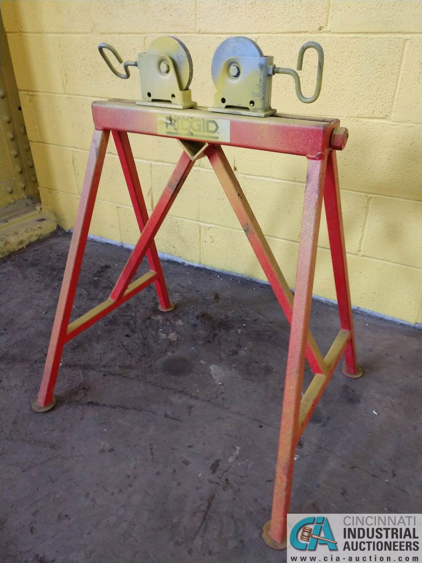 2,500 LB. RIDGID MODEL AR-99 ADJUSTABLE STAND WITH STEEL ROLLERS **LOCATED AT 1400 OAK ST.,