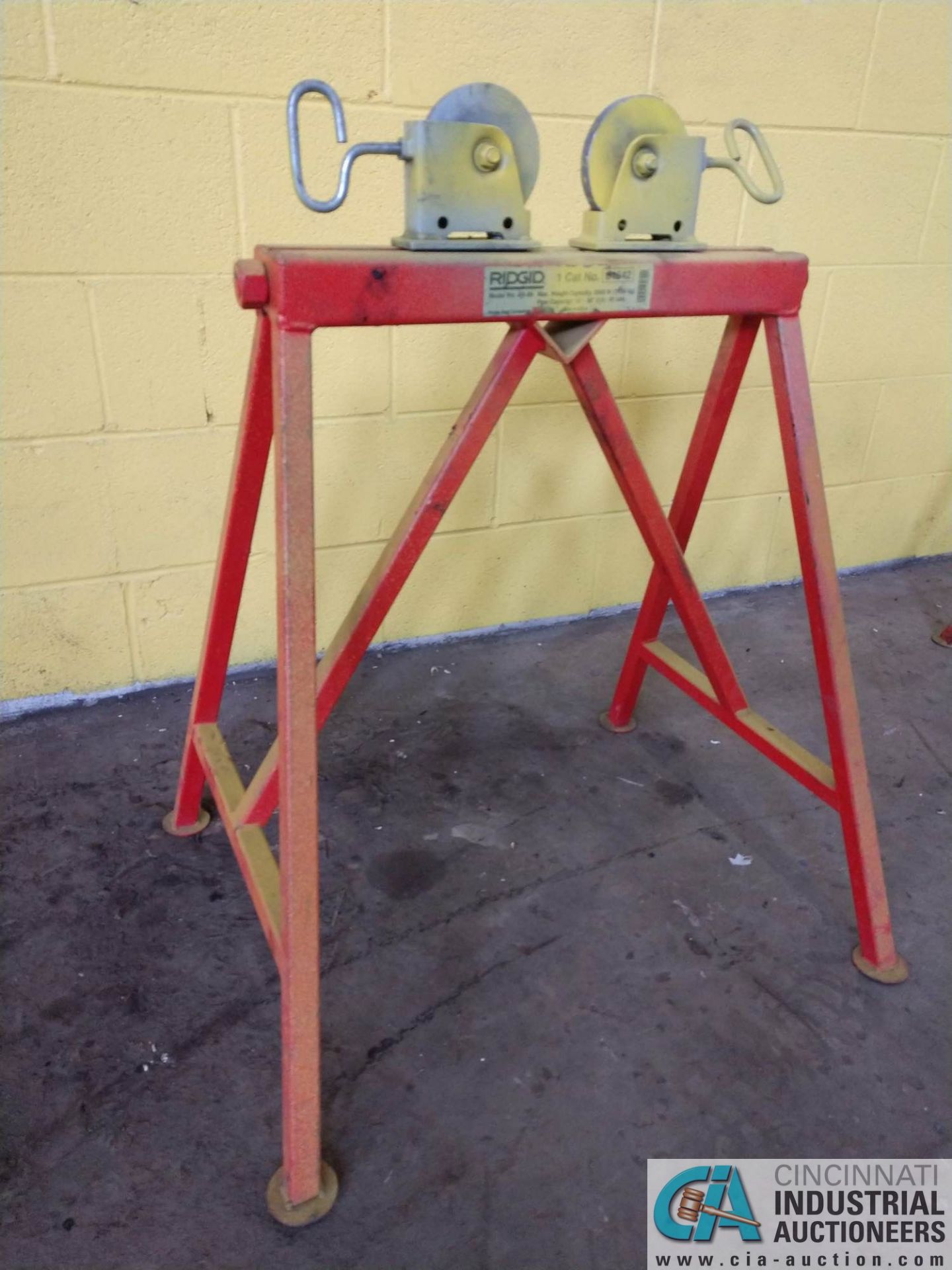 2,500 LB. RIDGID MODEL AR-99 ADJUSTABLE STAND WITH STEEL ROLLERS **LOCATED AT 1400 OAK ST.,