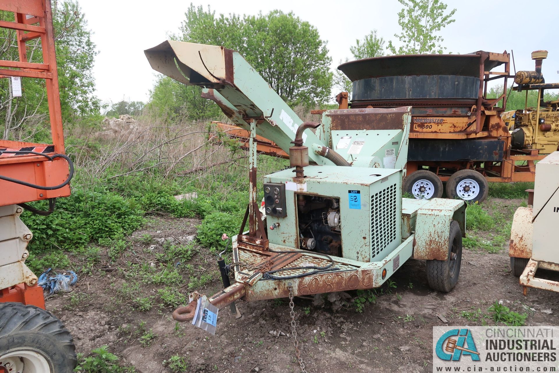 WOODCHUCK HD FRAME MODEL 12 ROTOR MODEL TRAILER MOUNTED DIESEL POWERED WOOD CHIPPER; S/N