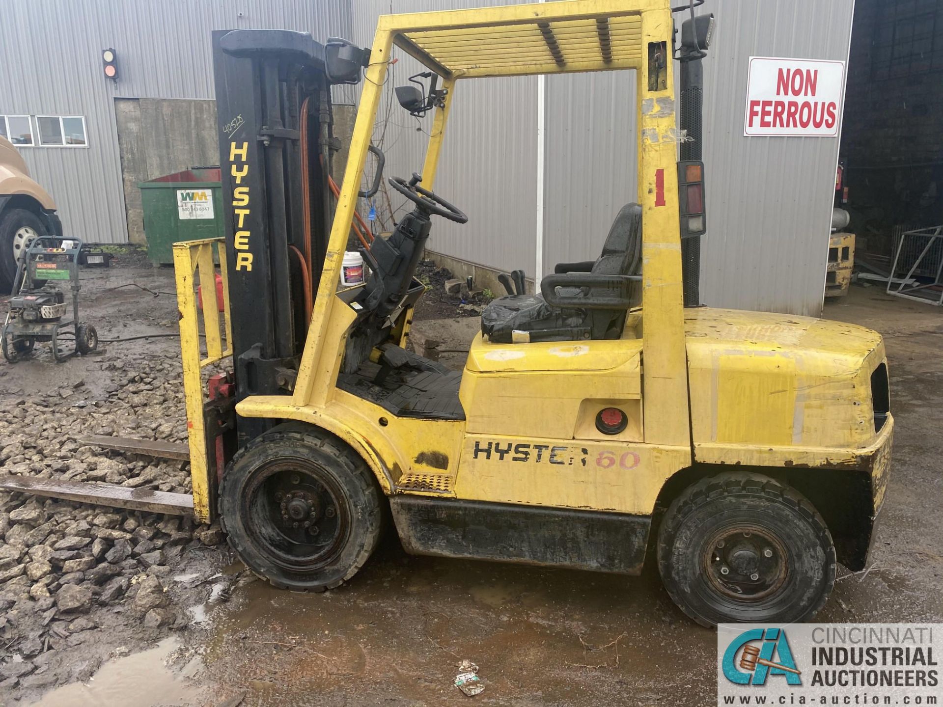 6,000 LB. CAPACITY HYSTER H60XM DIESEL PNEUMATIC TIRE FORKLIFT; S/N D177B36393U, 3-STAGE MAST, 48"