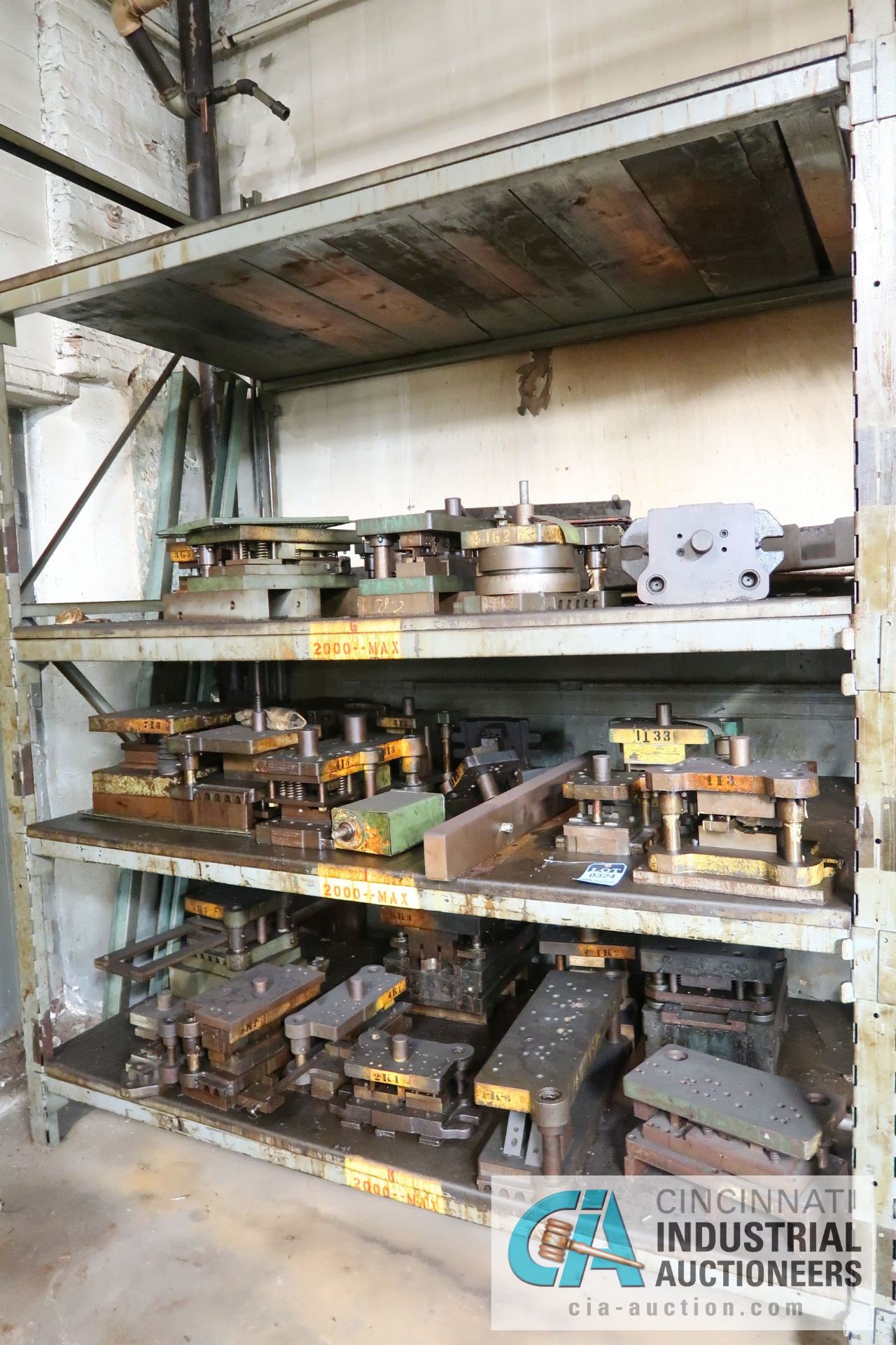 (LOT) CONTENTS OF (1) SECTION RACK CONSISTING OF PRESS DIES (APPROX. 30)