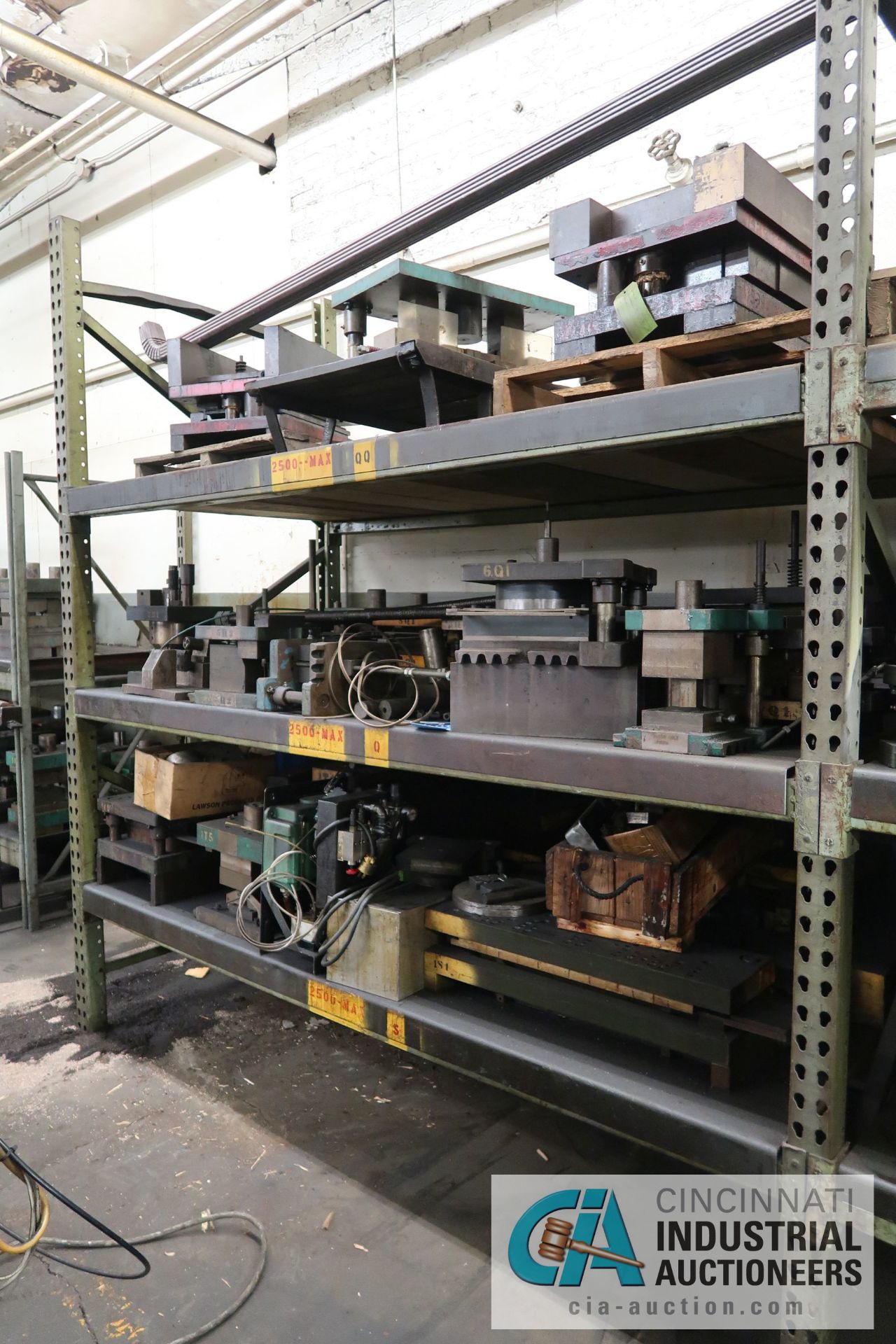 (LOT) CONTENTS OF (1) SECTION RACK CONSISTING OF PRESS DIES (APPROX. 36)
