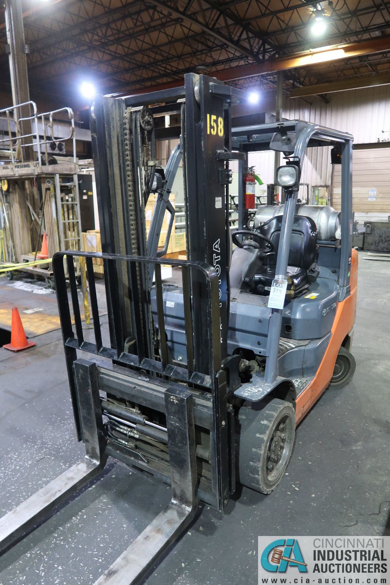 6,500 LB. TOYOTA MODEL 8FGCU32 LP GAS SOLID TIRE TWO-STAGE LIFT TRUCK; S/N 65675, 1,991 HOURS