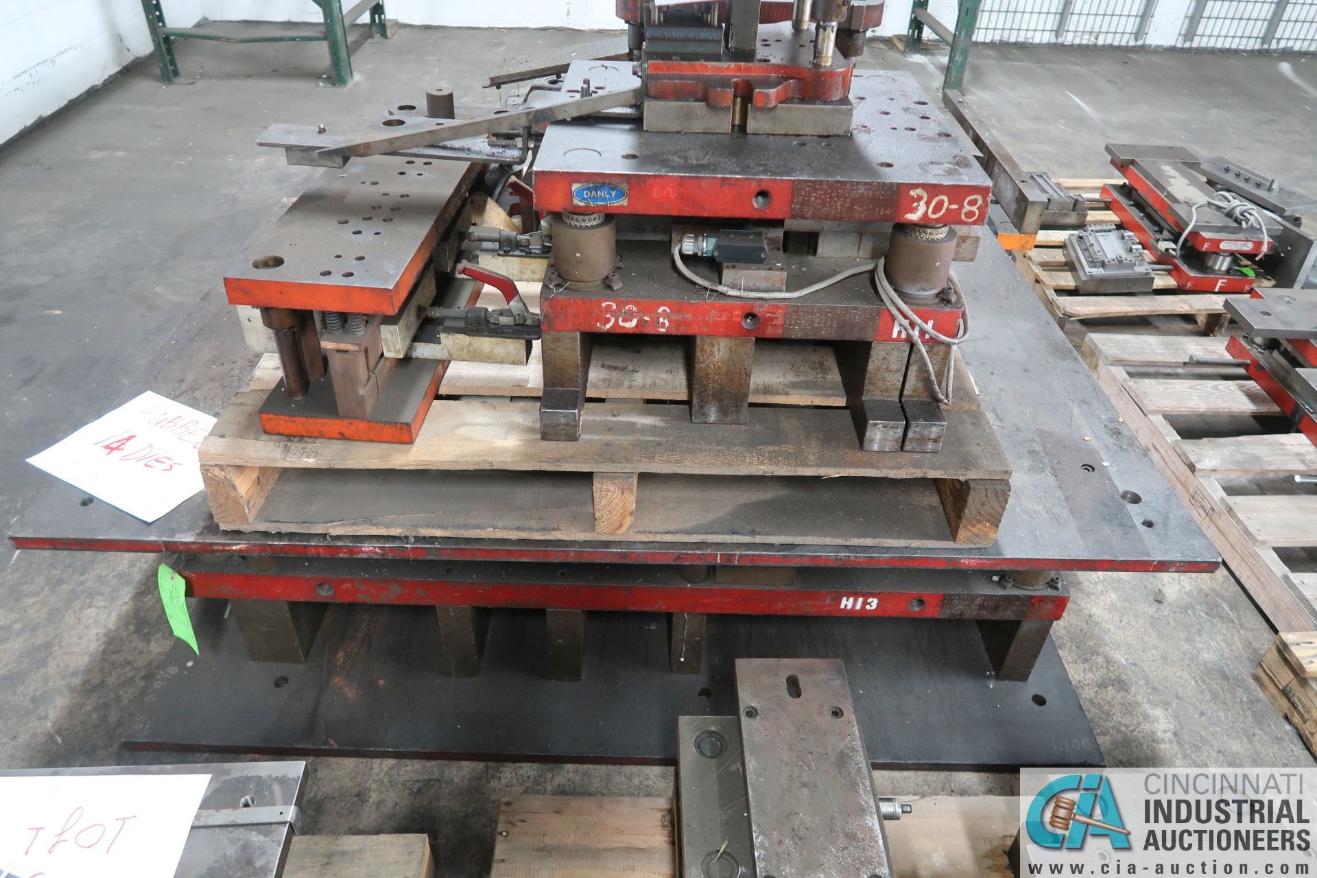 (LOT) LARGE QTY. PUNCH PRESS DIES IN (4) ROWS ON FLOOR - Image 14 of 34