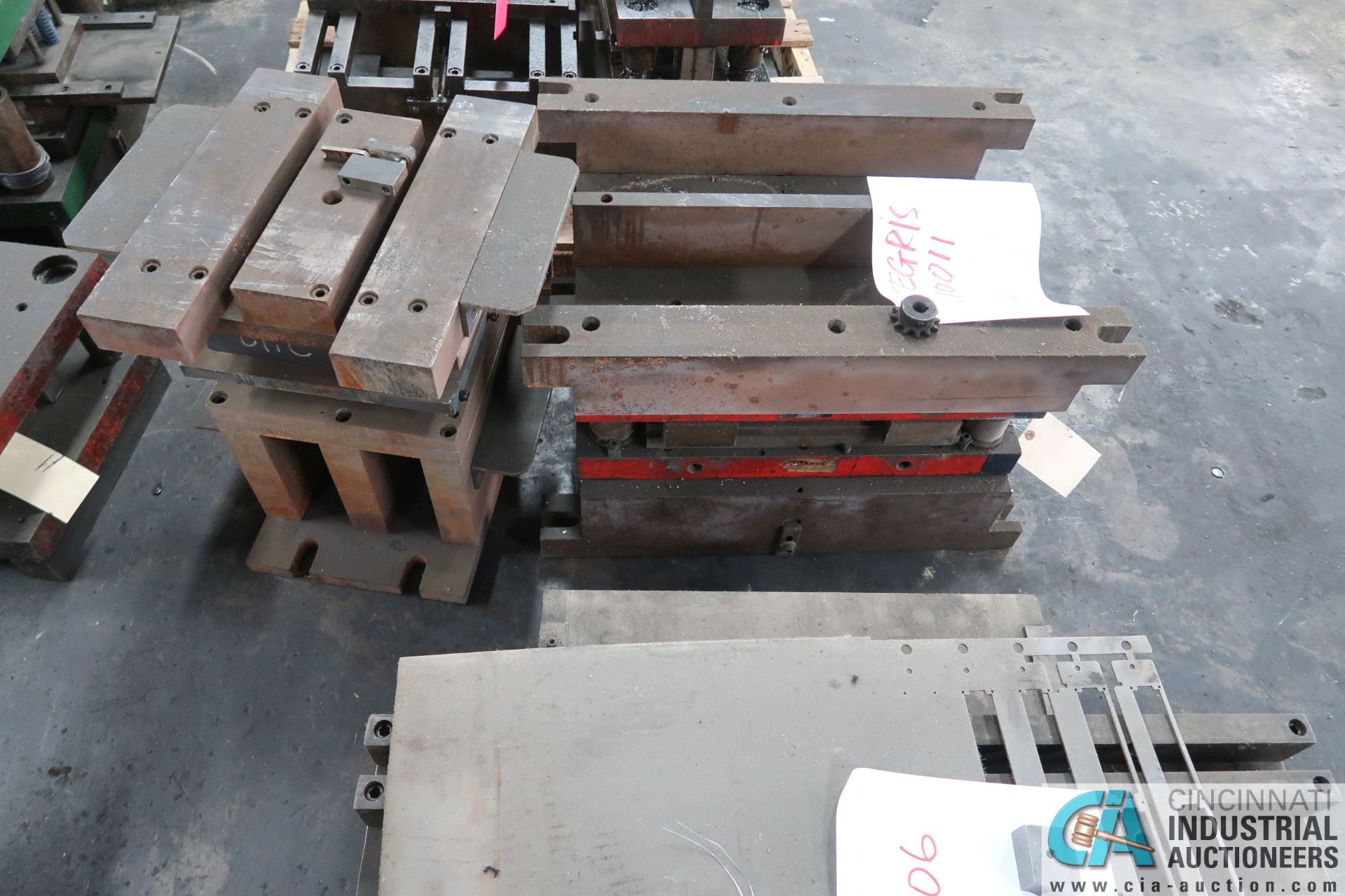 (LOT) LARGE QTY. PUNCH PRESS DIES IN (4) ROWS ON FLOOR - Image 29 of 34