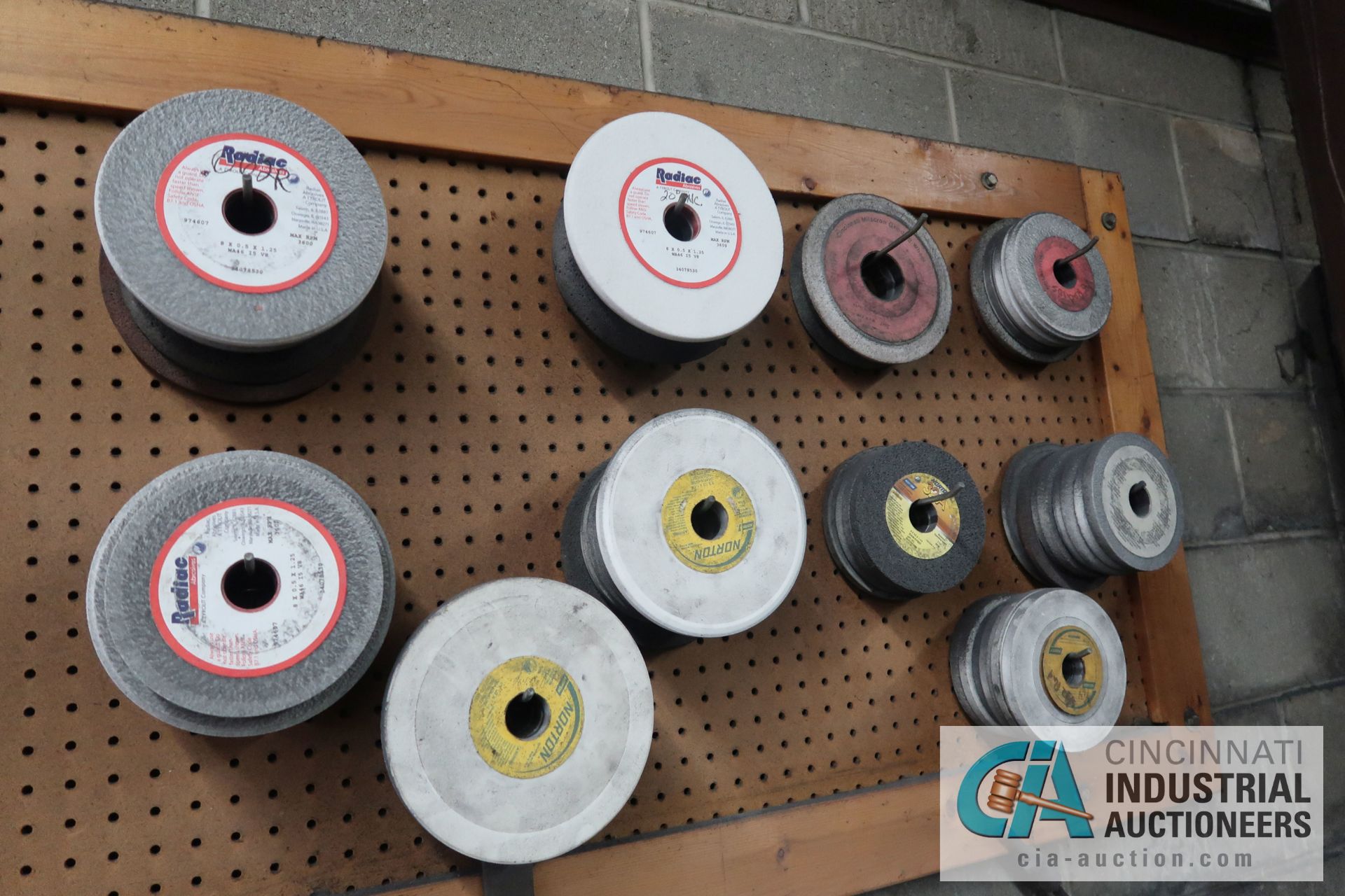 (LOT) MISCELLANEOUS GRINDING WHEELS ON WALL AND BENCH **PEGBOARD STAYS WITH BUILDING** - Image 4 of 7