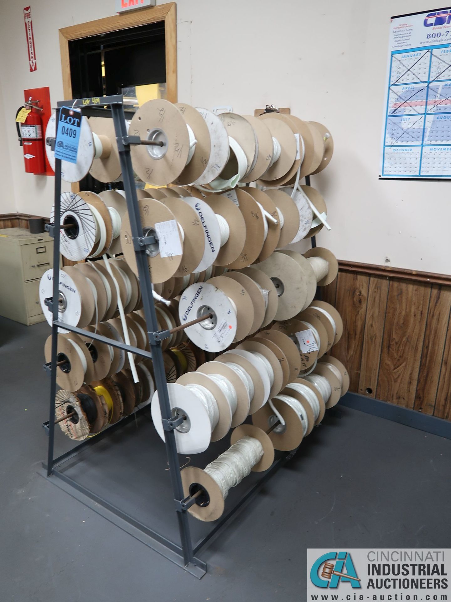 WIRE RACK WITH MISCELLANEOUS ROLLS OF WIRE INSULATION