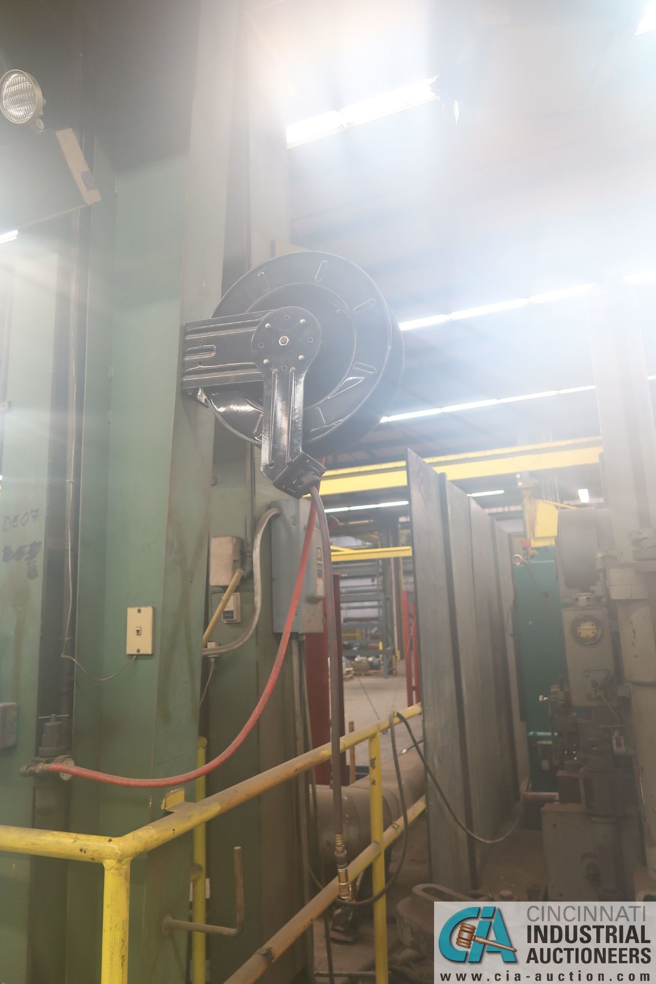 HANGING AIR HOSE REELS THROUGHOUT THE BUILDING