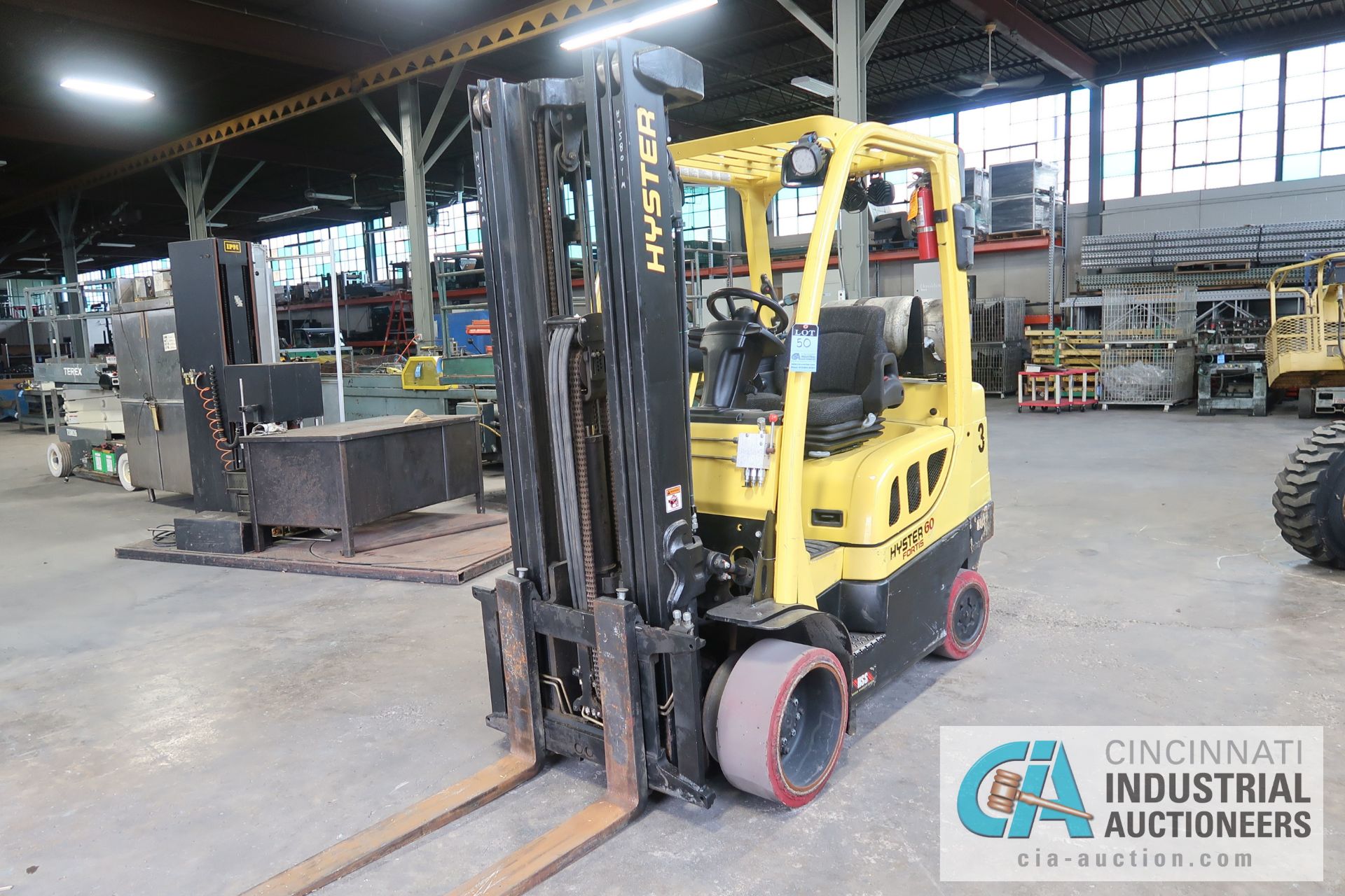 6,000 LB. HYSTER MODEL S60FT LP GAS CUSHION TIRE THREE STAGE MAST LIFT TRUCK; S/N F187V25801M,