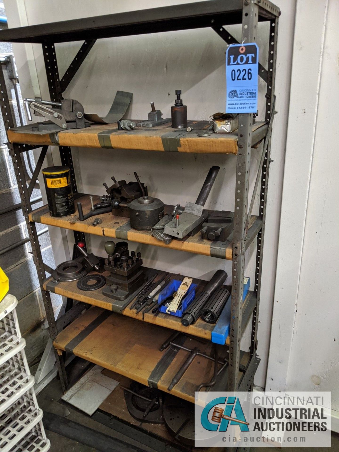 (LOT) SHELF UNIT WITH GRINDING FIXTURES AND ACCESSORIES AND GRINDING WHEELS ON WALL