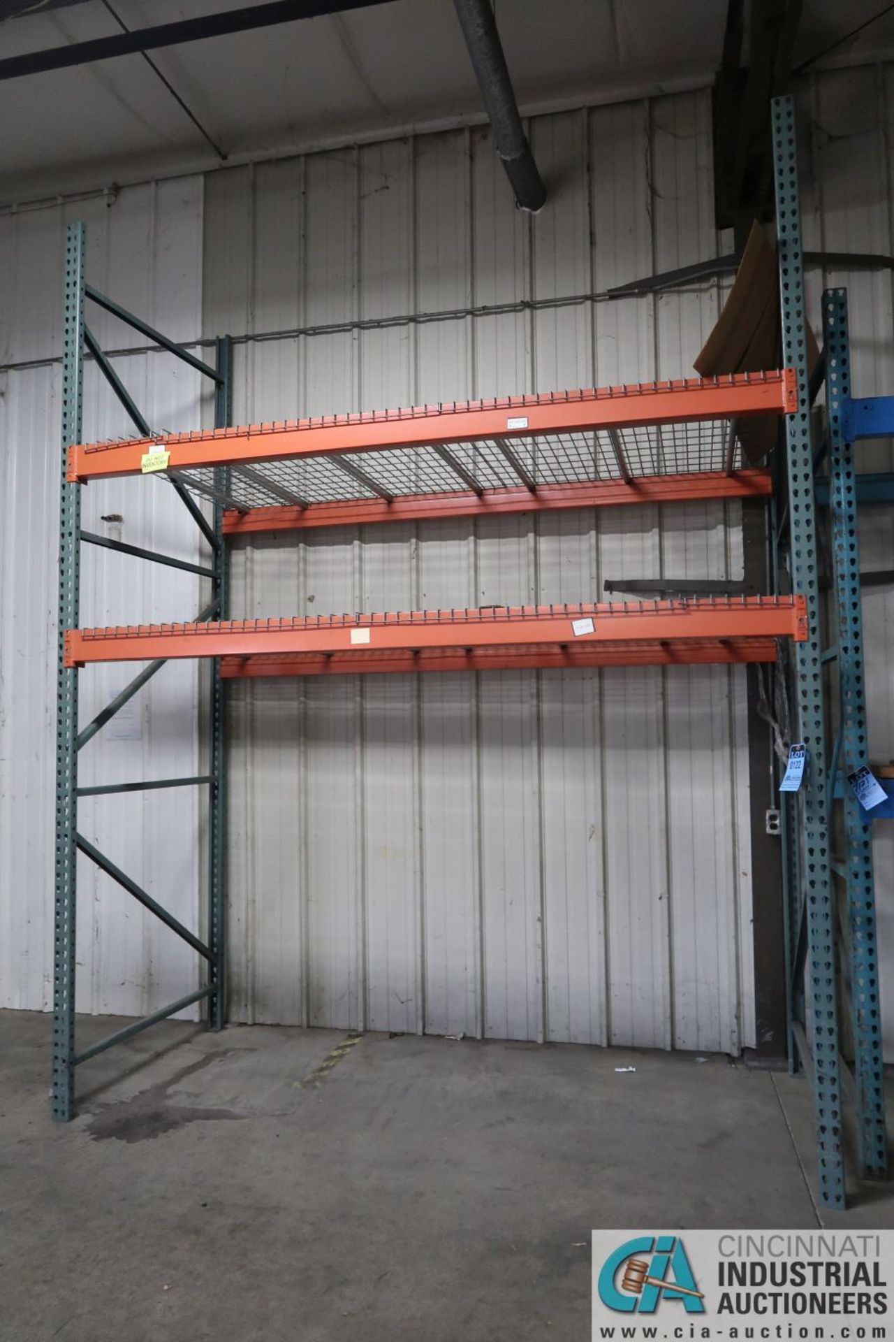 Free-Standing Sections Orange and Green Pallet Rack Along Dock Wall (8) Uprights, (14) Beams, (12)