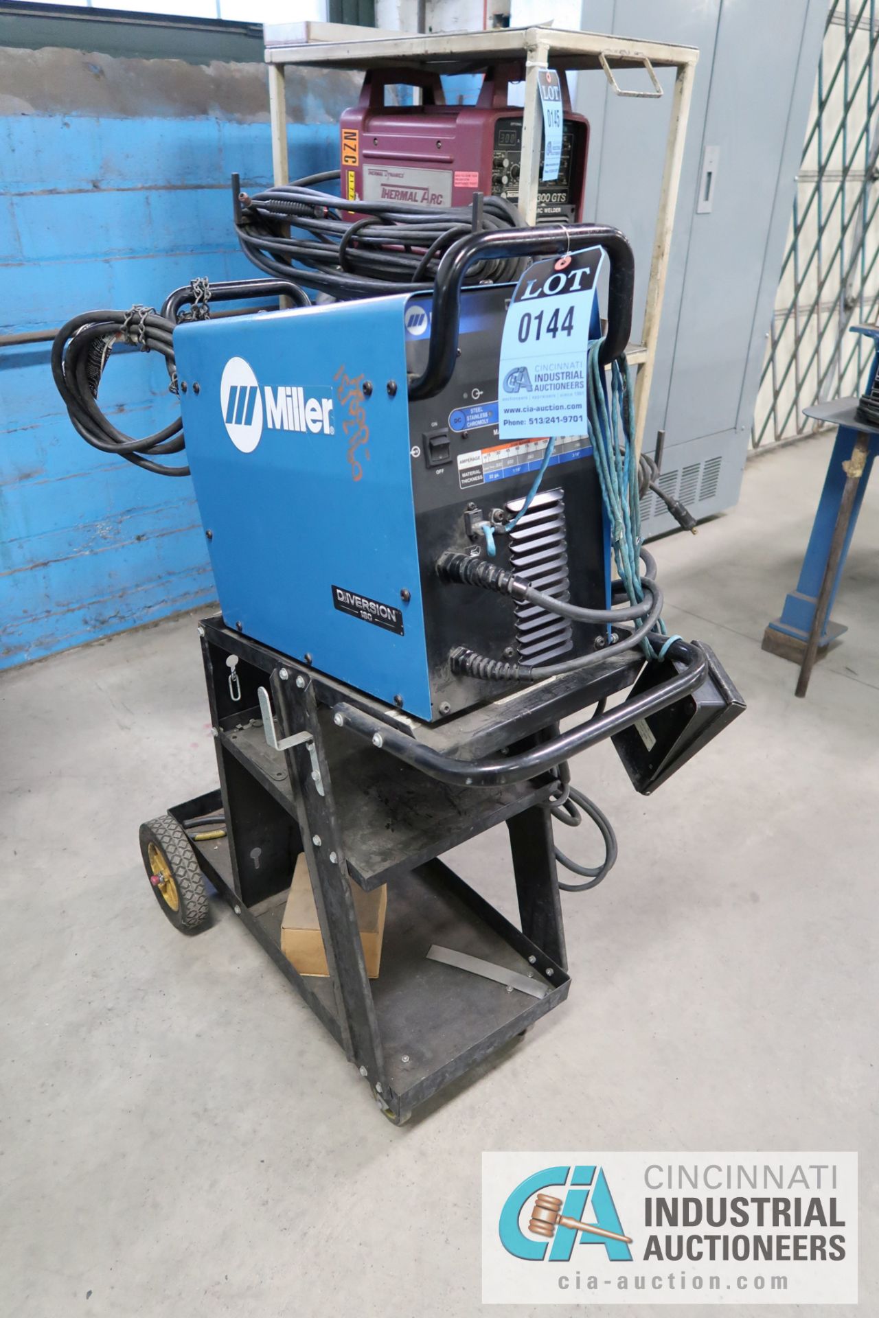 180 AMP MILLER DIVERSON 180 TIG WELDER POWER SOURCE; S/N MF360924L, WITH CART, LEADS, AND FOOT PEDAL