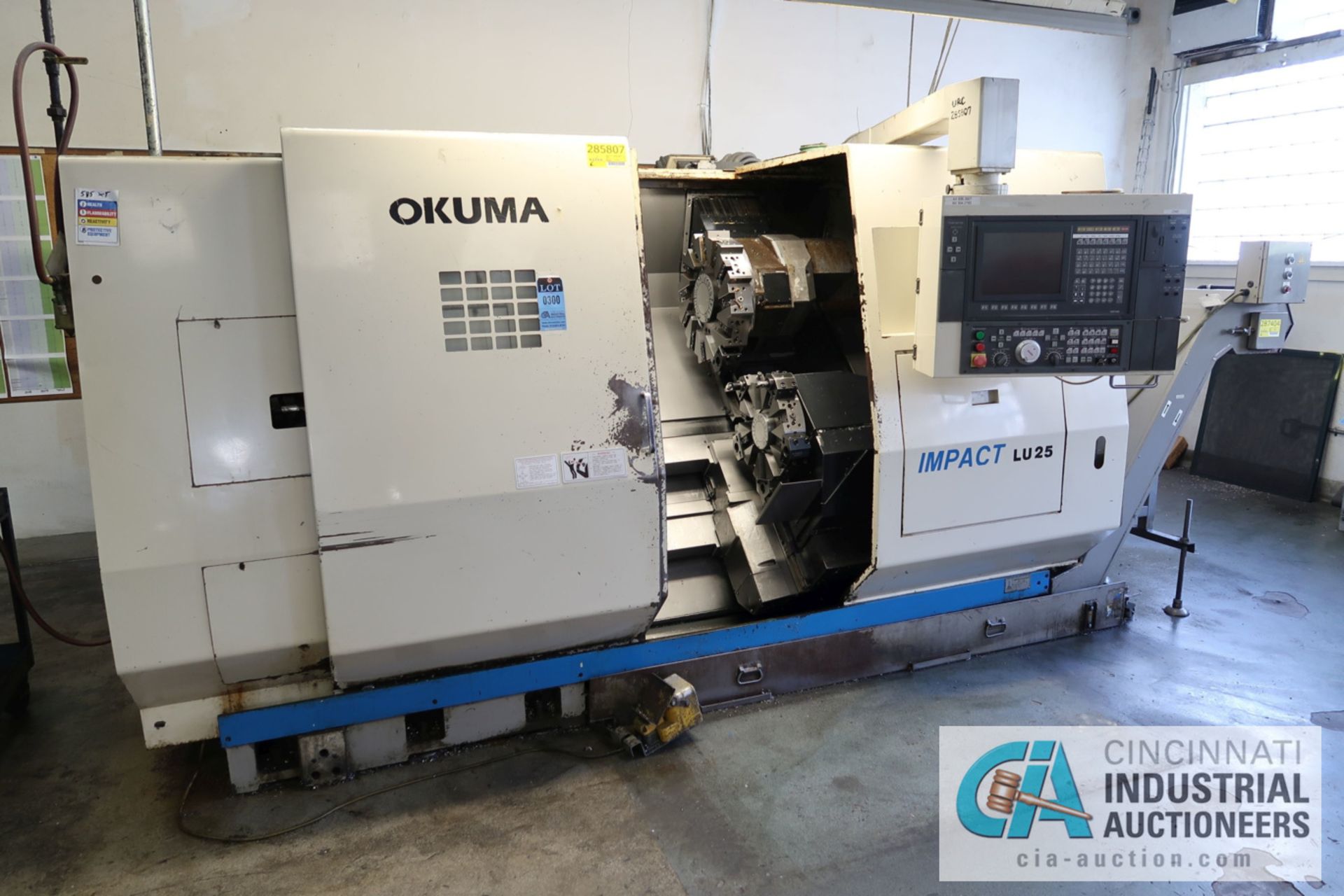 OKUMA MODEL IMPACT LU25 CNC TURNING CENTER; S/N 0051, 26" SWING, 12-POSITION UPPER AND 10-POSITION