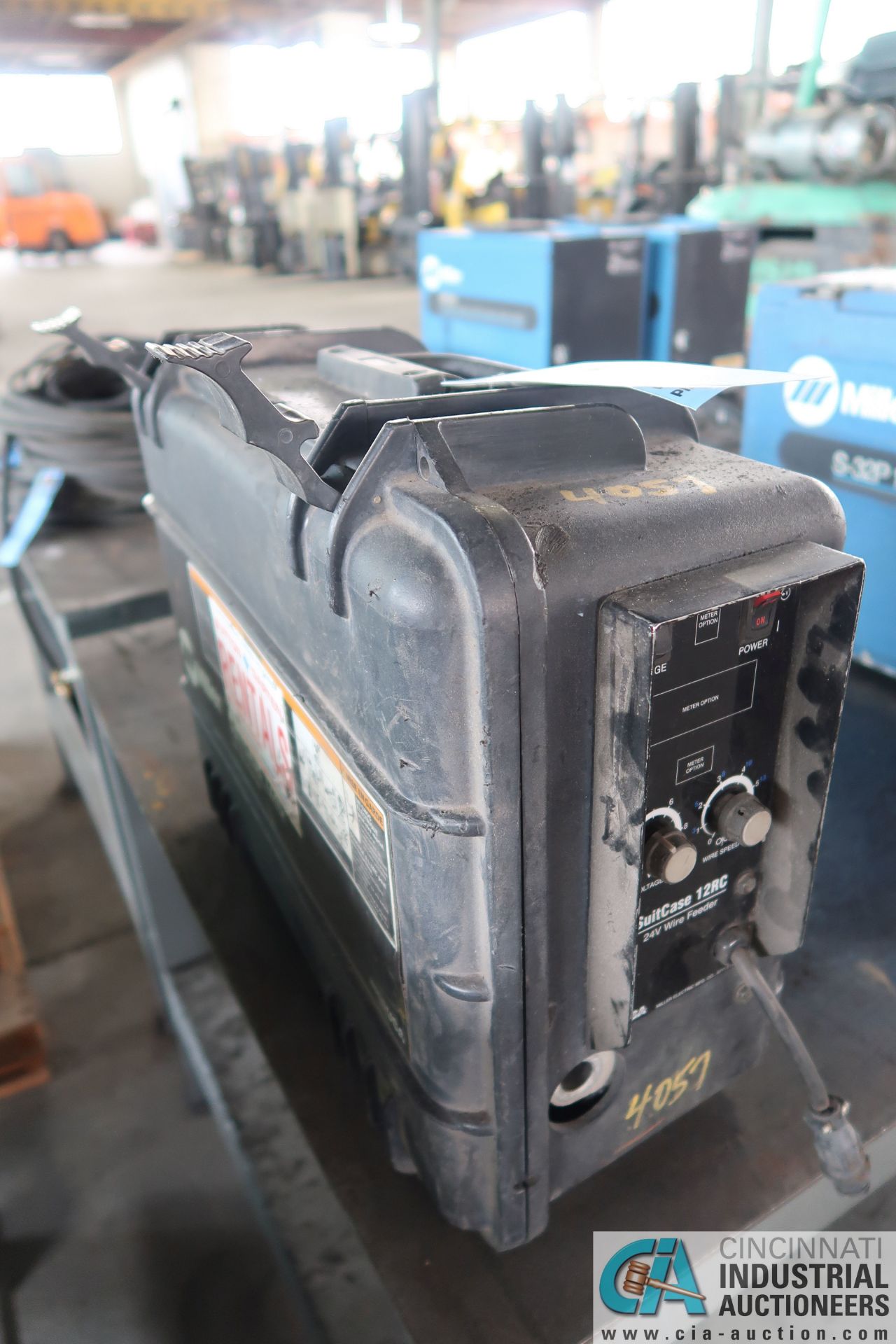 MILLER MODEL 12RC SUITCASE WELDER / 24-VOLT WIRE FEEDER **LOCATED AT 110 EAST SEYMOUR AVE.,