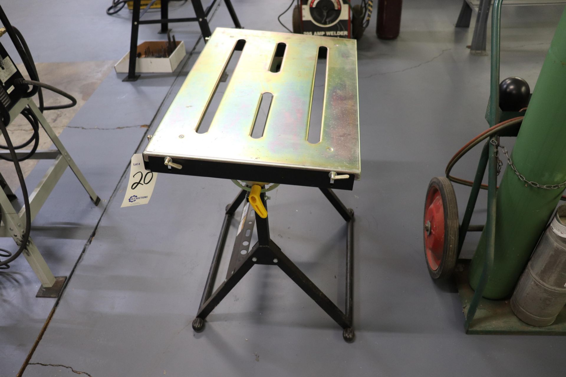 Adjustable welding table