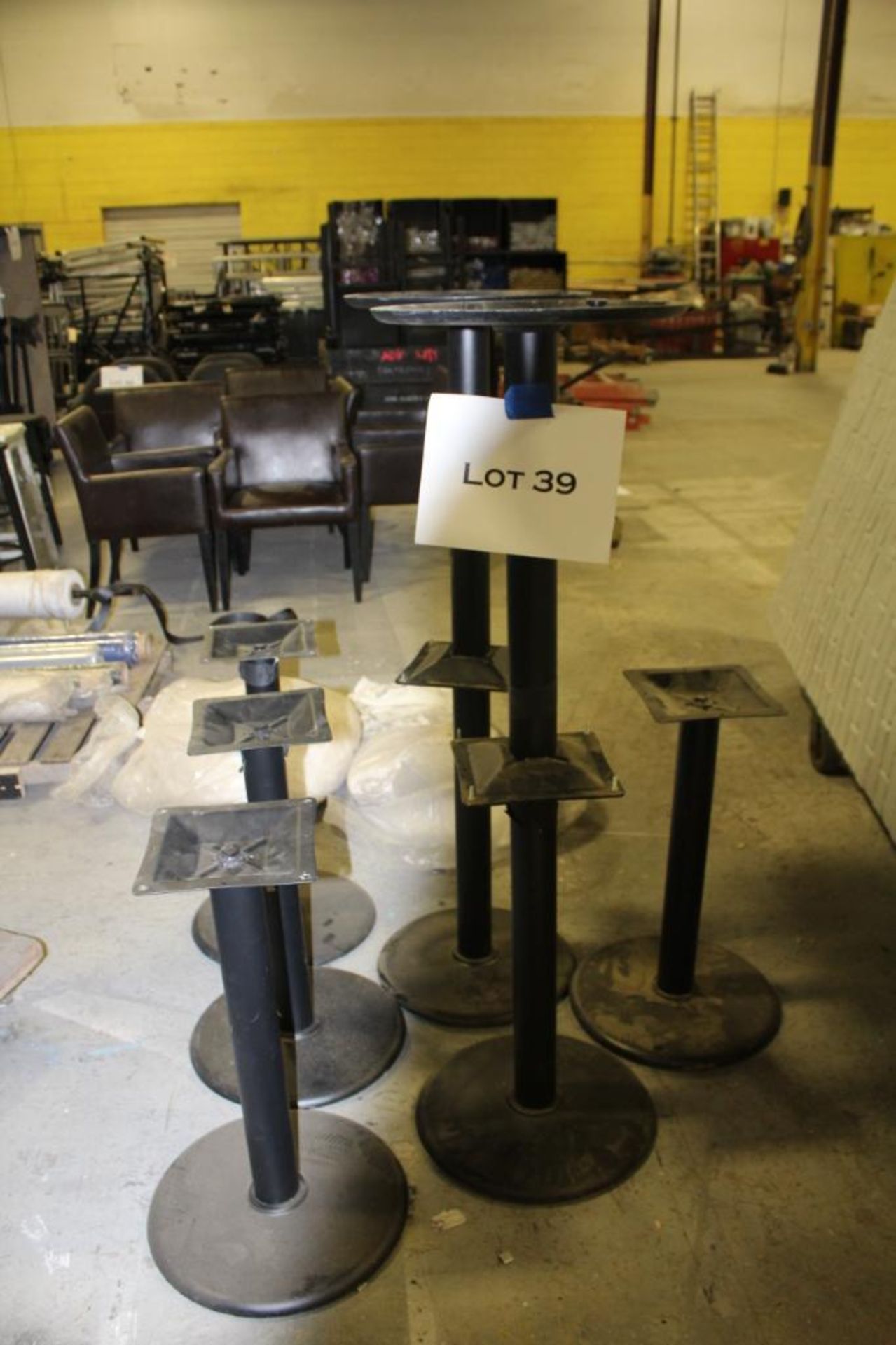 8 Black metal pedestal table bases