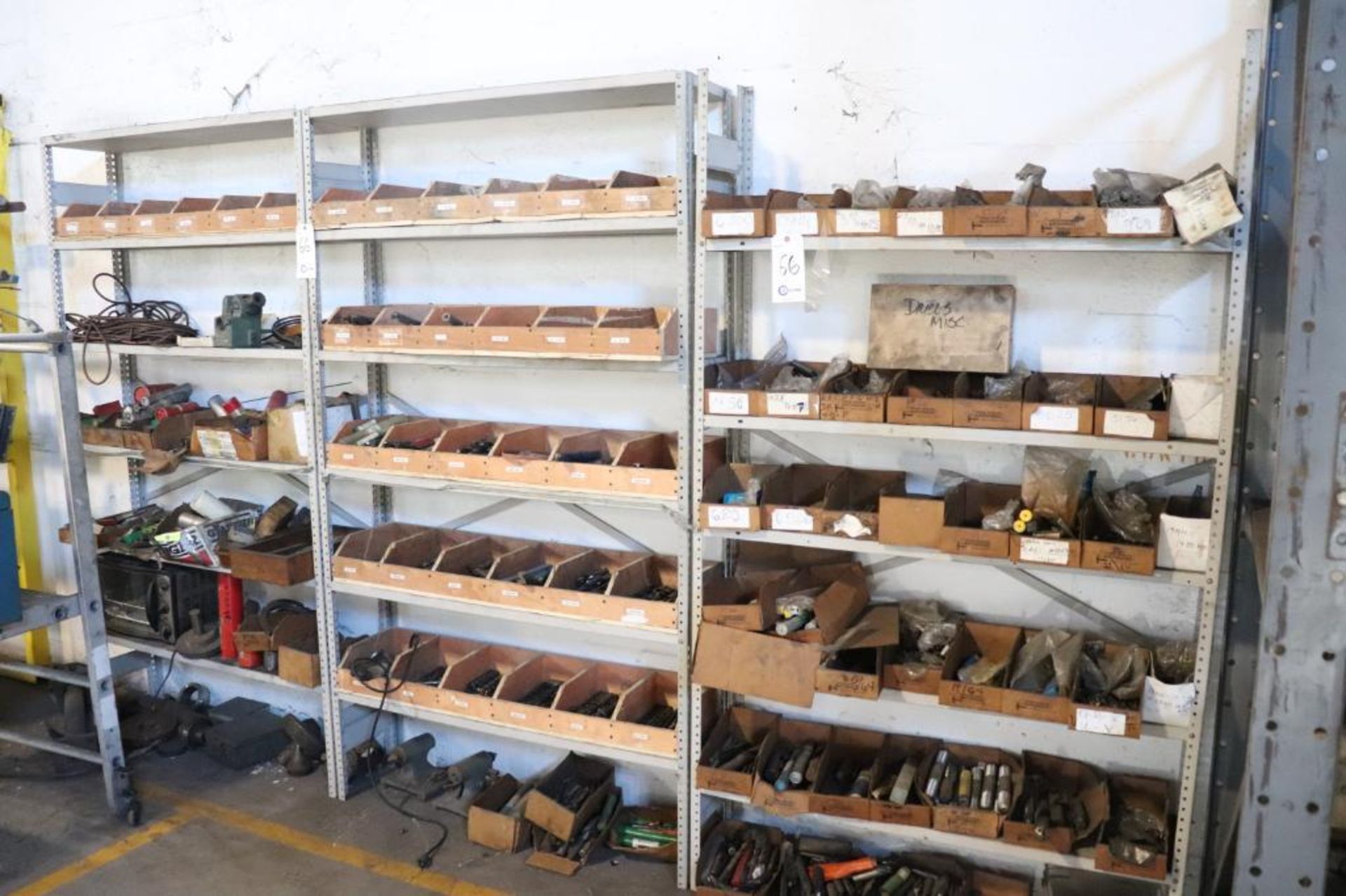 Adjustable shelving w/ large quantity of drills