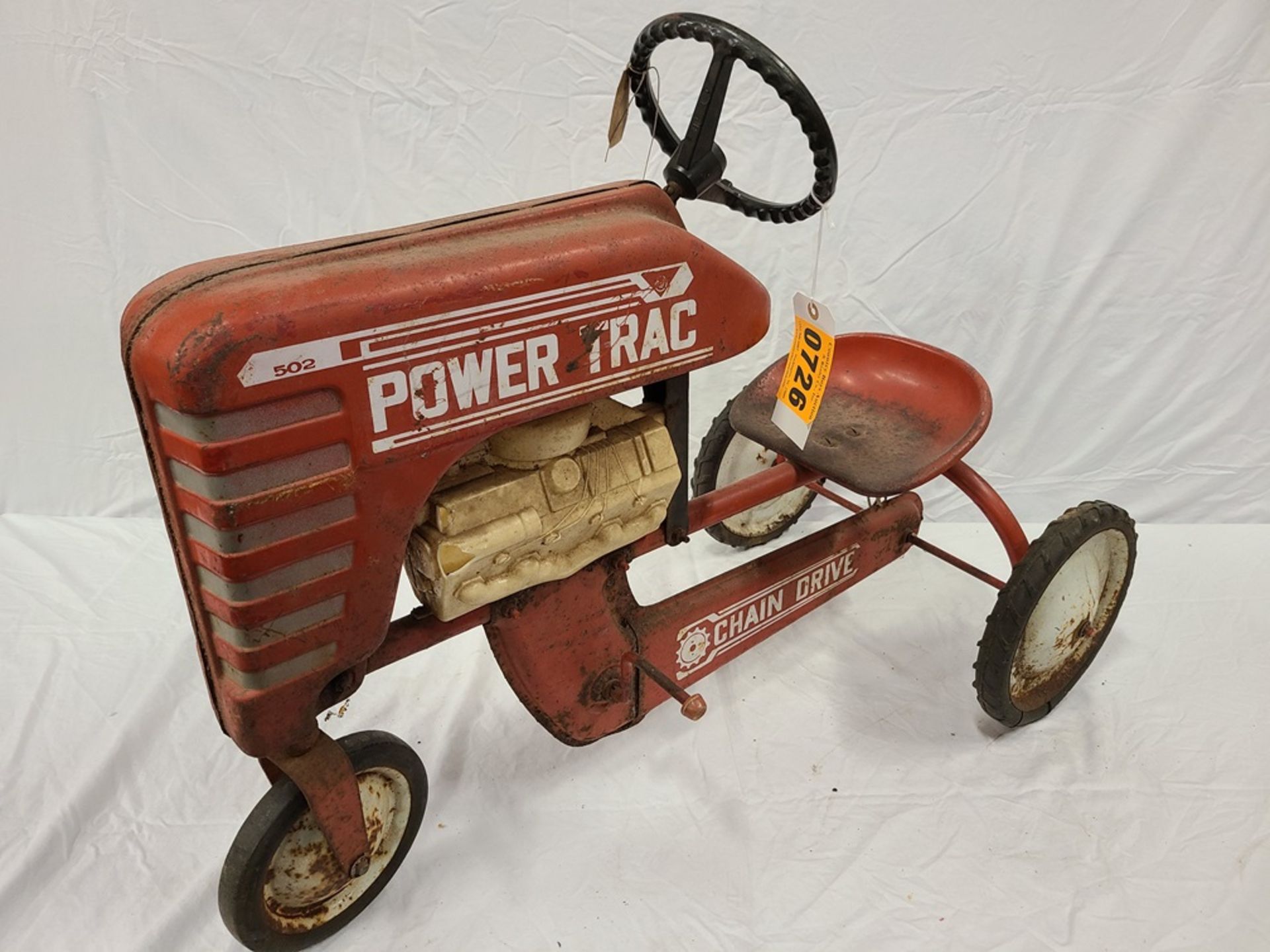 red "502 Power Trac" tricycle pedal tractor (metal/plastic)