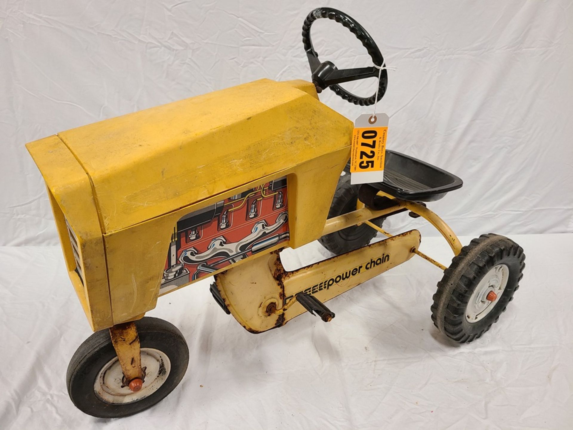 yellow "Tractor" tricycle pedal tractor (metal/plastic)