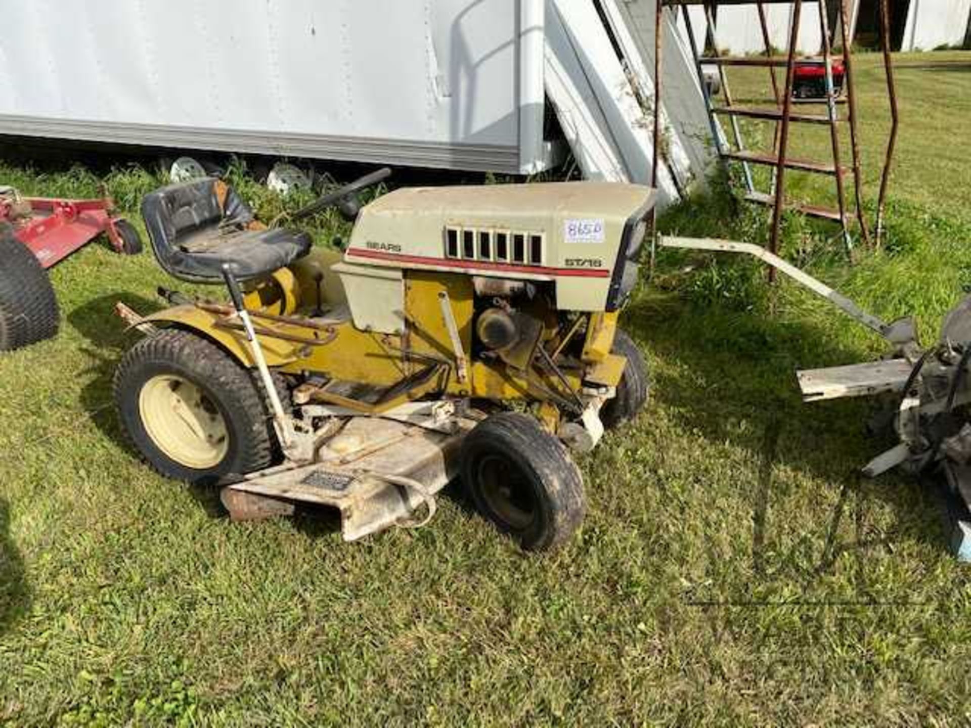 SEARS ST16 GARDEN TRACTOR W/ SNOW BLOWER & ROTO TILLER