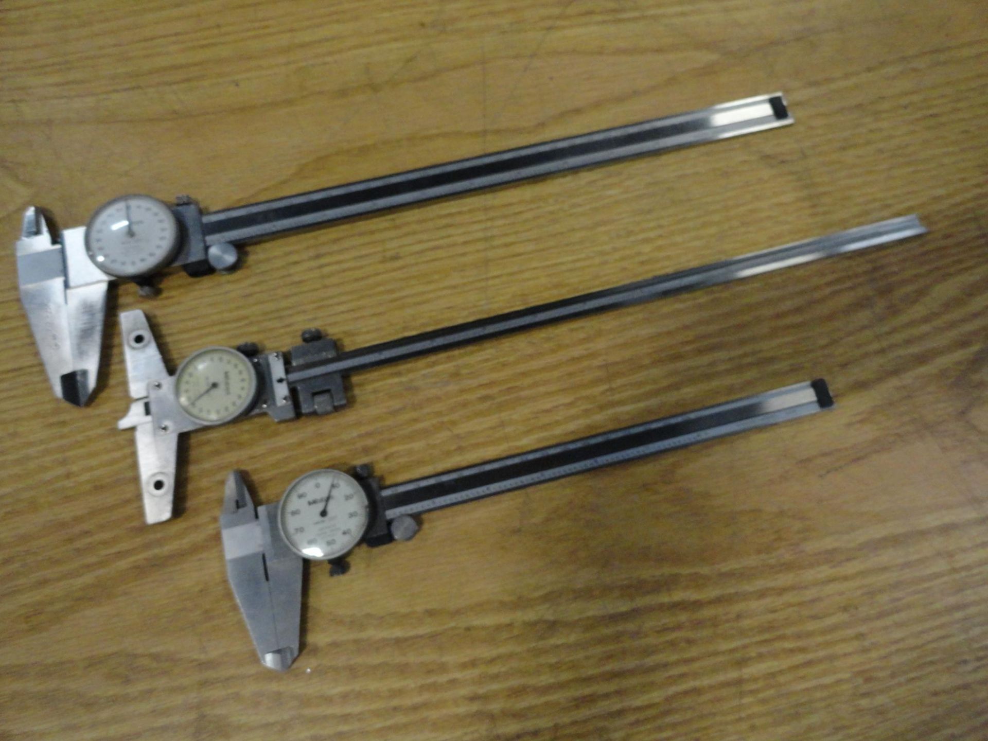 (3) Mitutoyo dial calipers, 8 and 12 inch, .001 inch increments