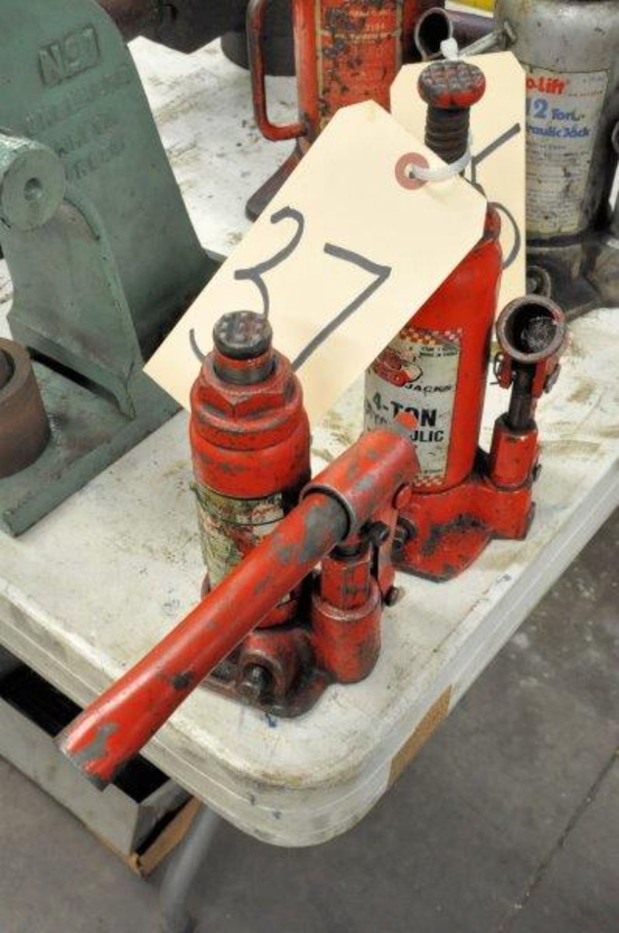 Lot-(1) 4-Ton and (1) 2-Ton Hydraulic Bottle Jacks, (Metal Fab Room)