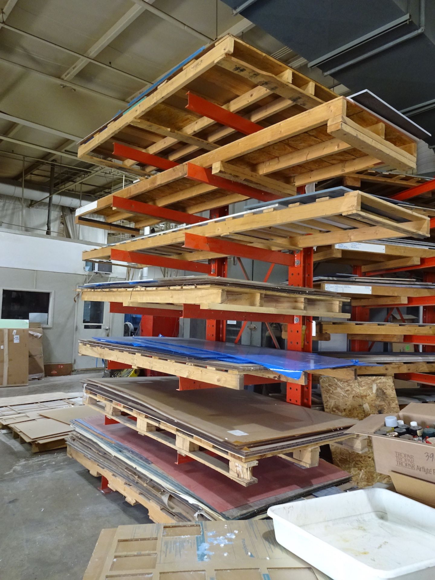 LOT: Assorted Material on (3) Cantilever Racks (Excludes All Metal Material)