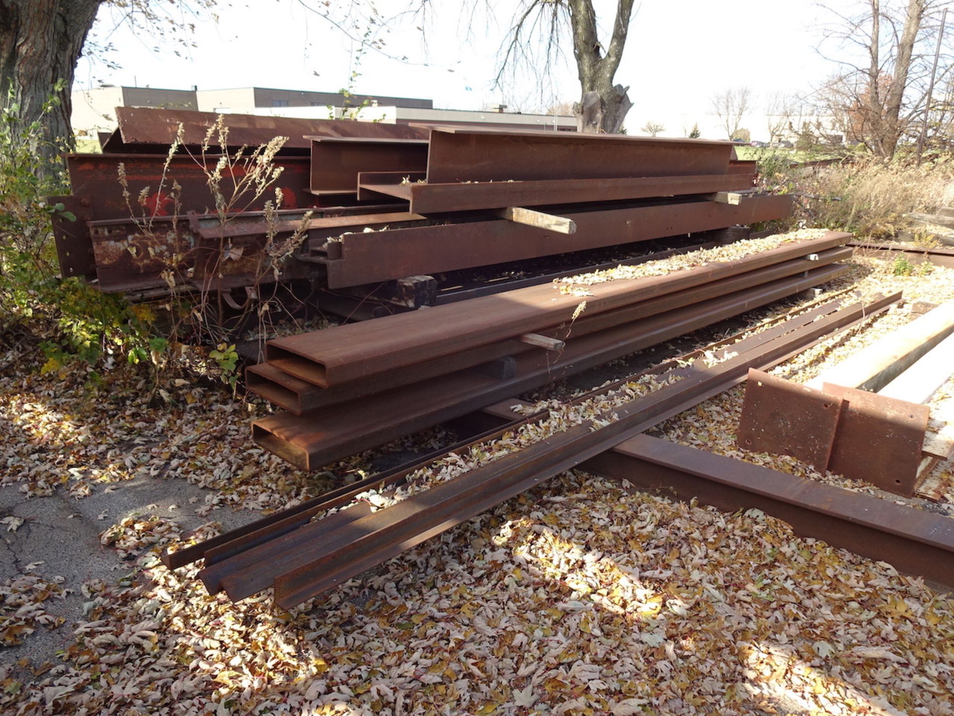 LOT: All Scrap on Southwest Side of Building including I-Beam, Tubing, Square, Channel, Steel Racks, - Image 15 of 24