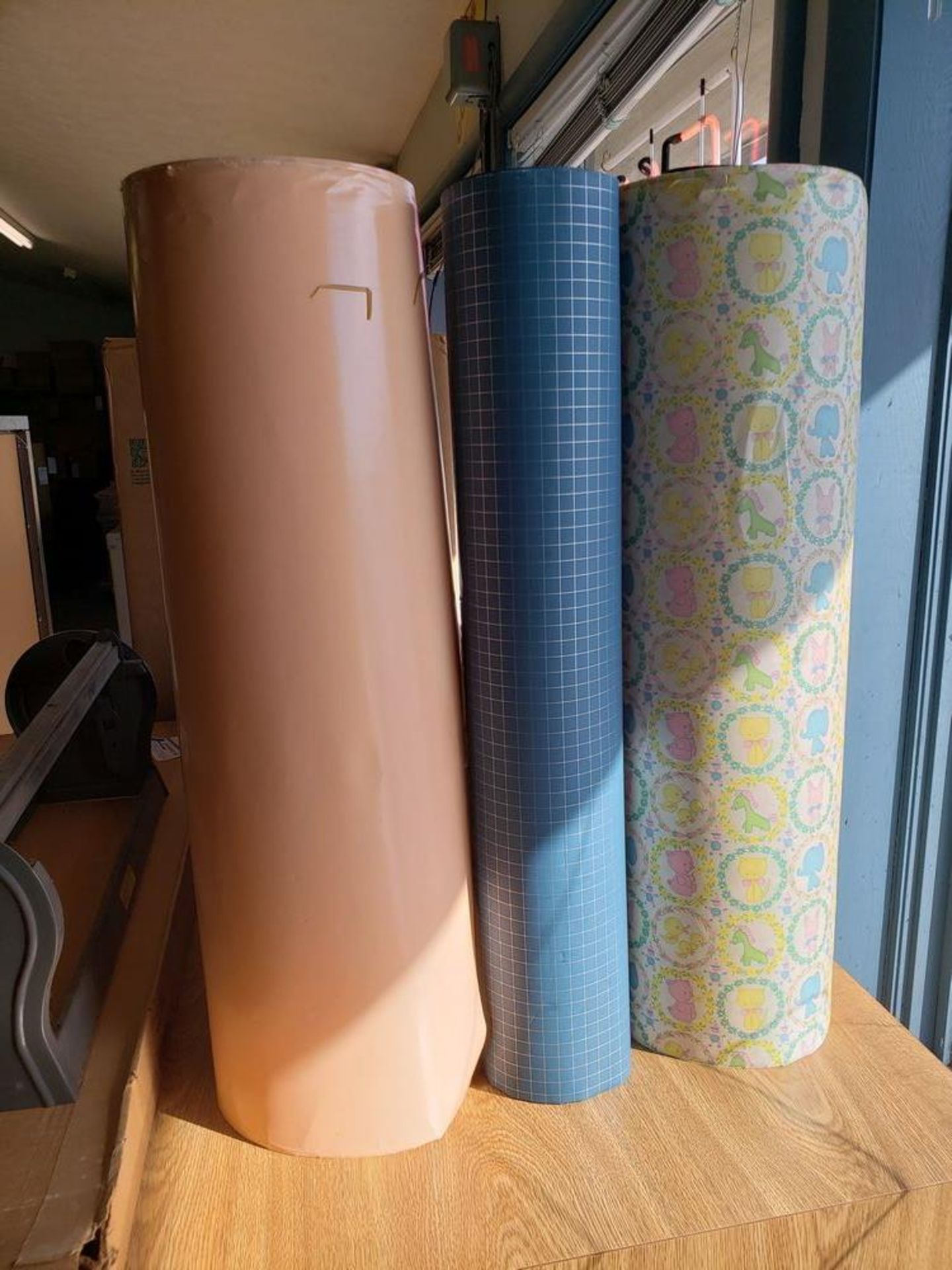 ROLLS OF WRAPPING PAPER WITH 4 PAPER CUTTERS (Note: Your bid is multiplied by the quantity) - Image 2 of 5