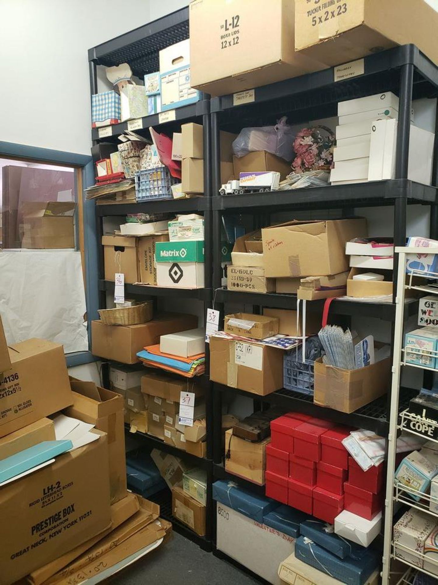 LOT OF MISC ON 2 SECTIONS OF SHELVING (SHIPPING TAGS AND SHELVING NOT INCLUDED)