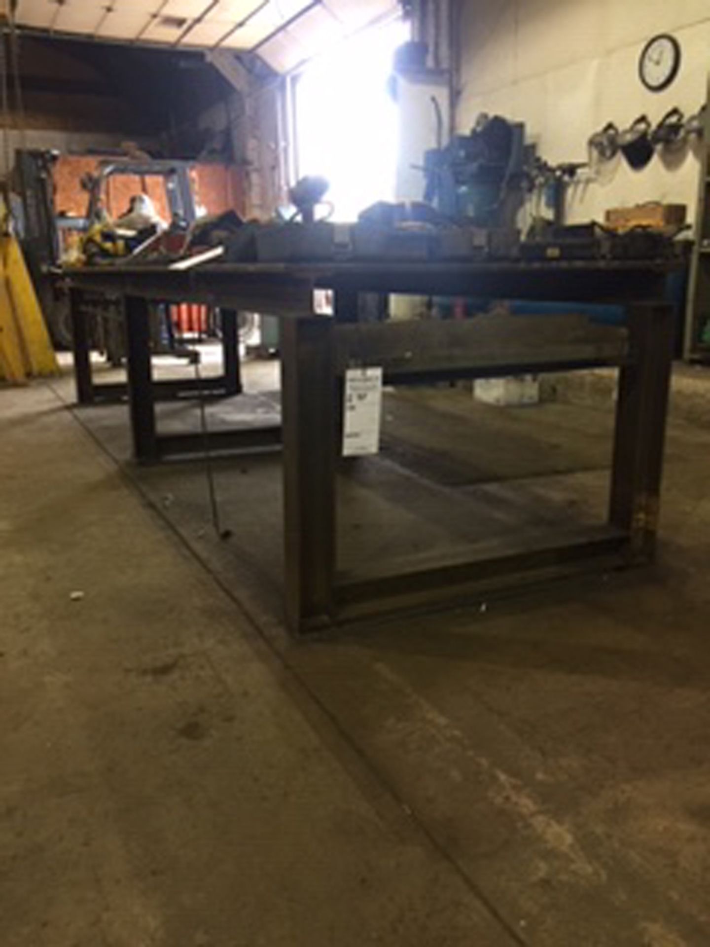 15' long x 4' wide x approx. 1/2" plate welding table