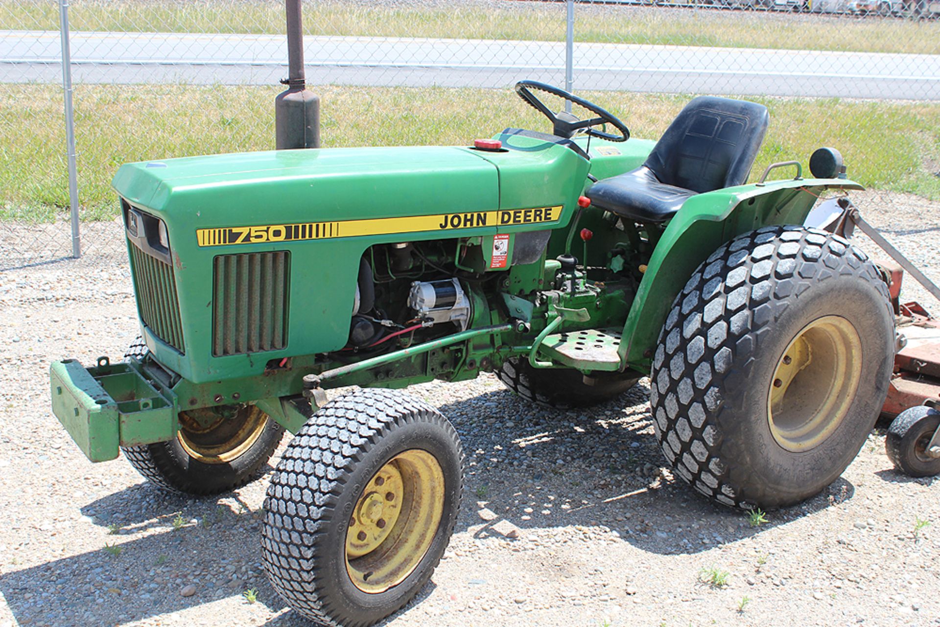 JOHN DEERE 750 DIESEL TRACTOR WITH 3 PT., PTO, 2719 HOURS WITH TURF TIRES