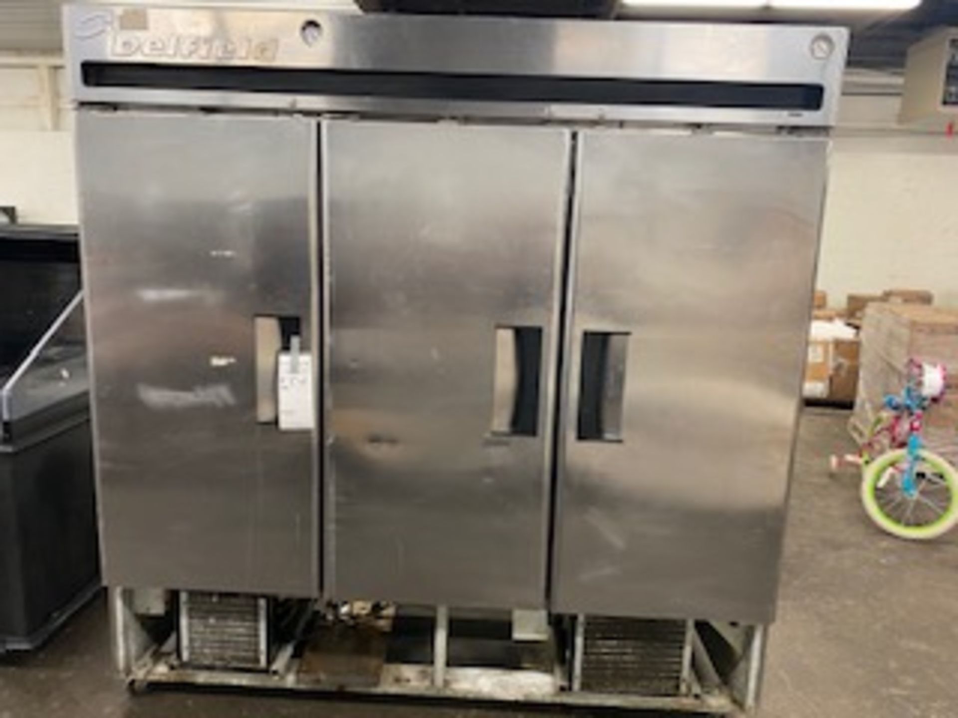 3 door Delfield freezer 6' long x 79" tall