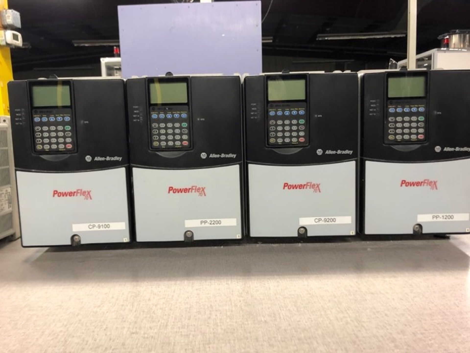 Allen Bradley Powerflex 70 VFDs including (1) 15 HP, (4) 10 HP and (2) 5 HP Rigging Fee: $200