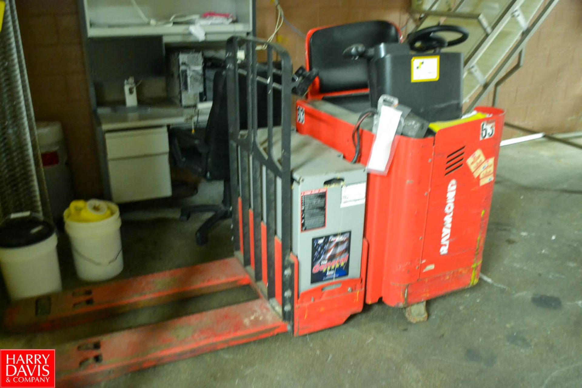 Raymond Electric Stand Ride Forklift with Battery