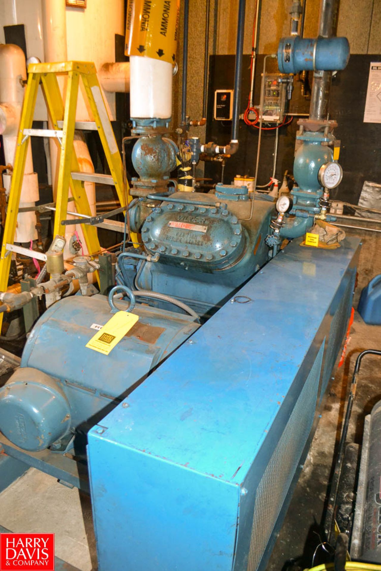 Vilter Model VMC444 4 cylinder ammonia compressor with 60 hp motor, suction and discharge valves and