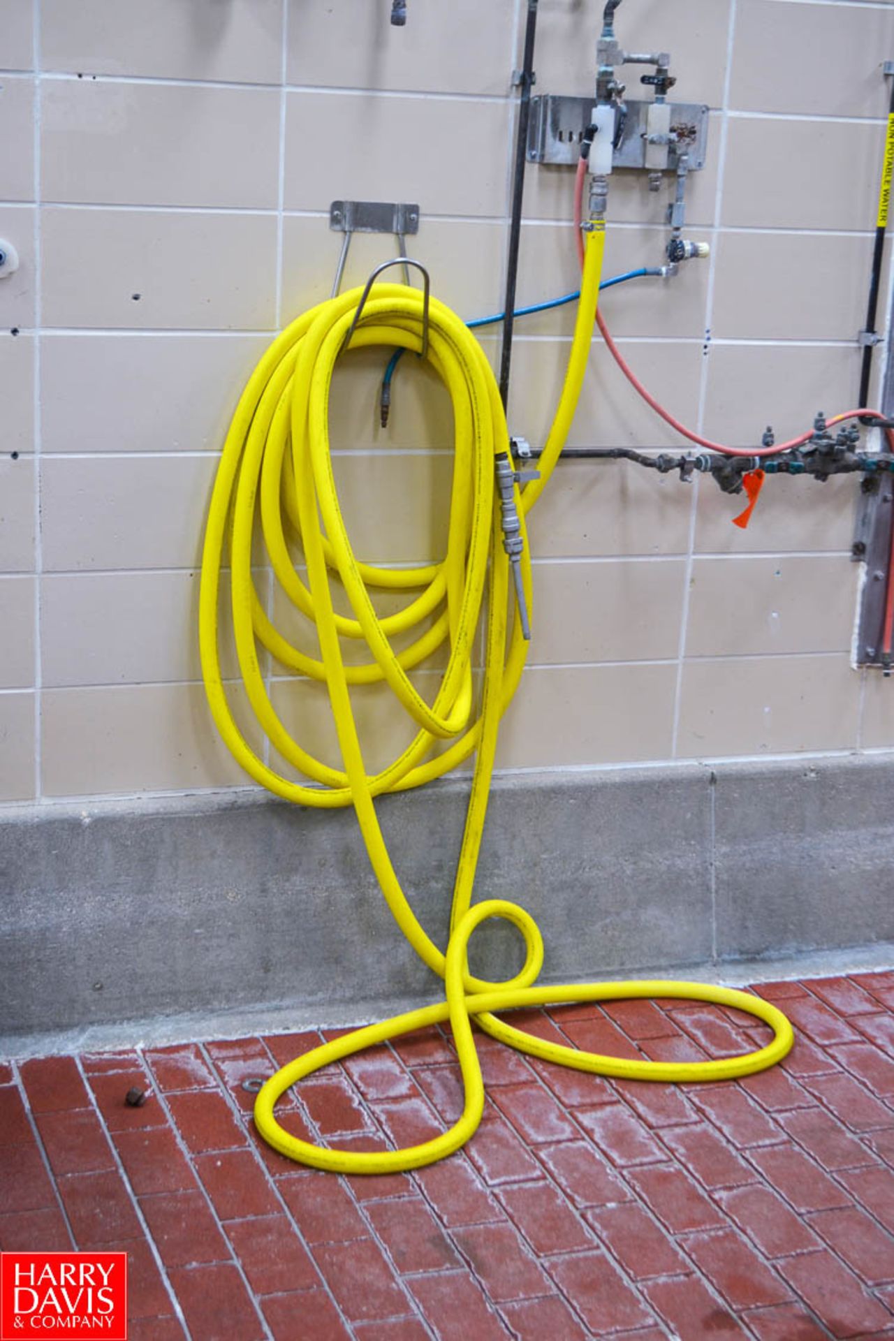 All Yellow Water Hoses On First Floor; Estimated Hundreds Of Feet (No Valves)