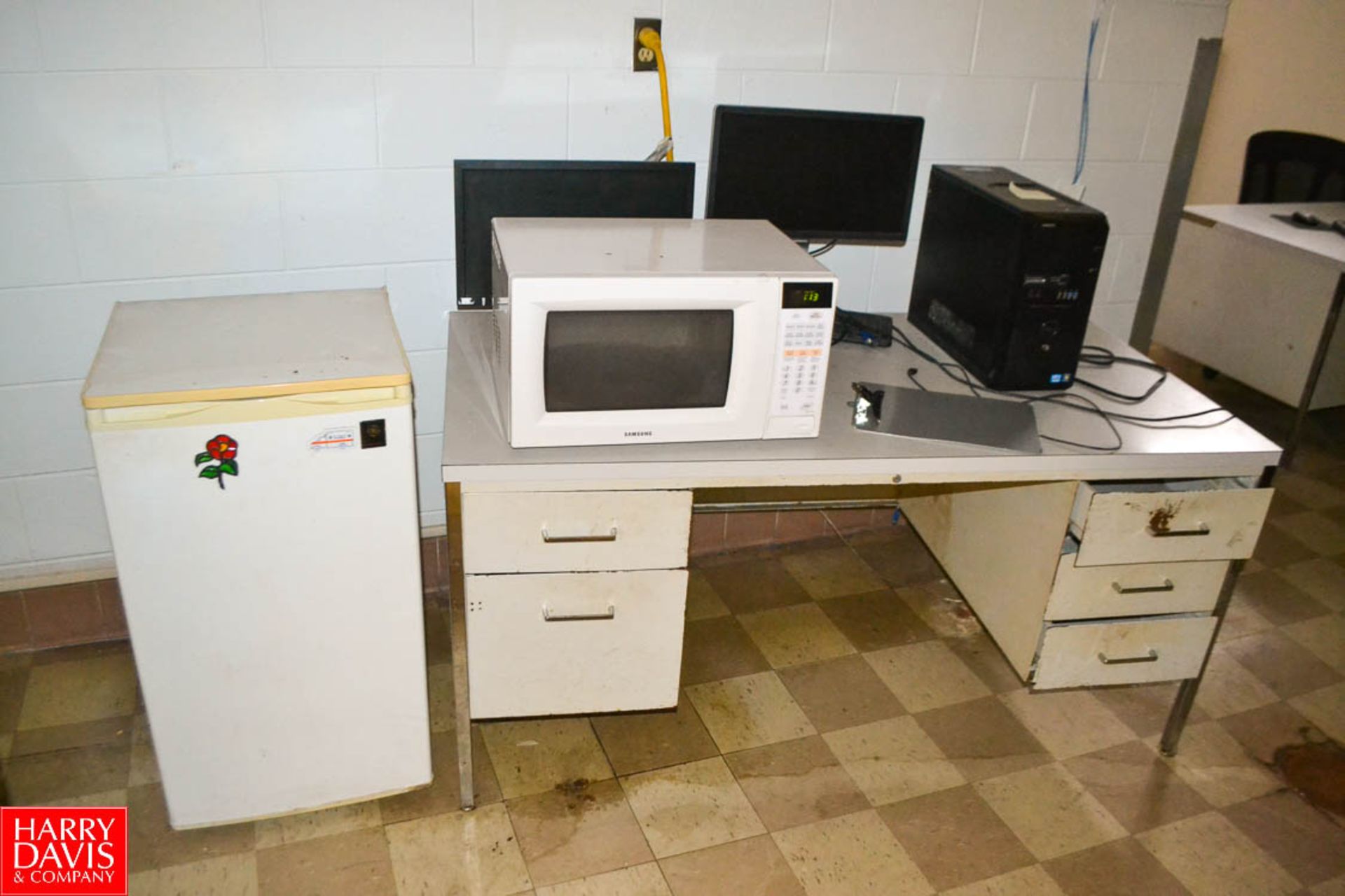 Contents of large basement office with 4 desks, 2 chairs, mini-fridge, microwave and 3 computers