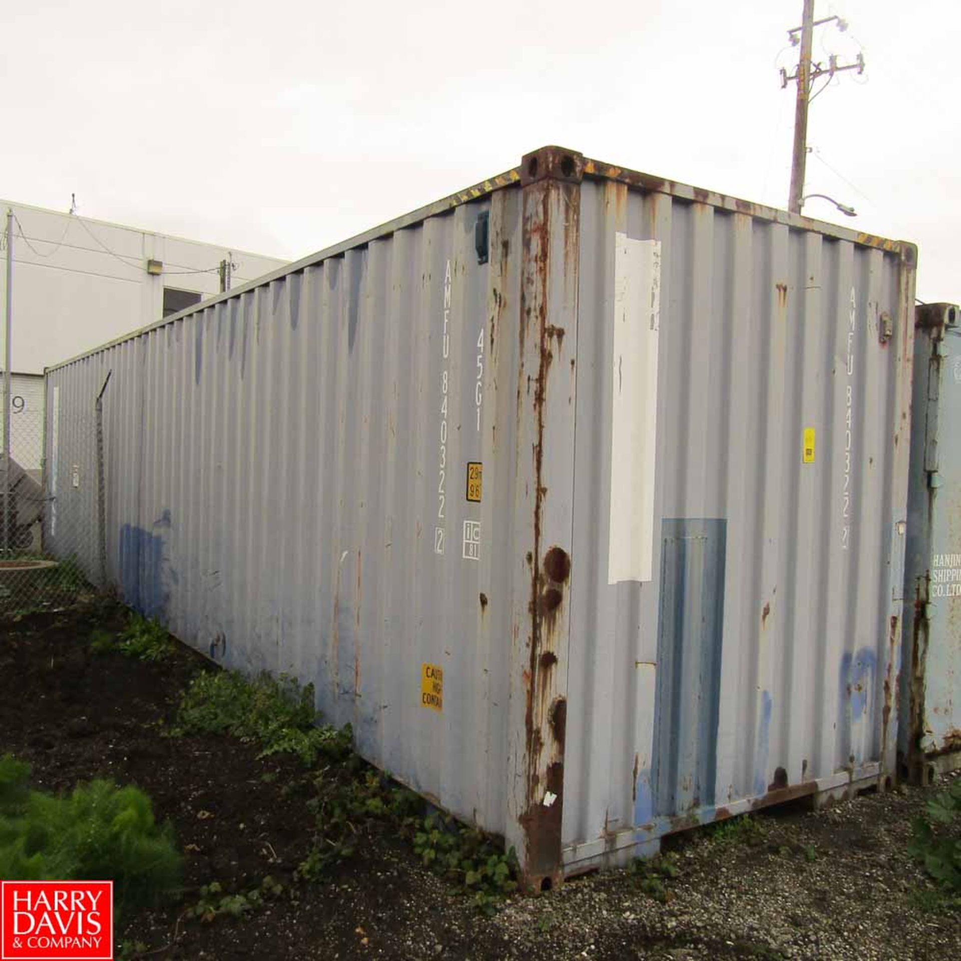 40' Shipping Container with Contents Including: Shelving Units, Metal Piping, Ladders, Scales