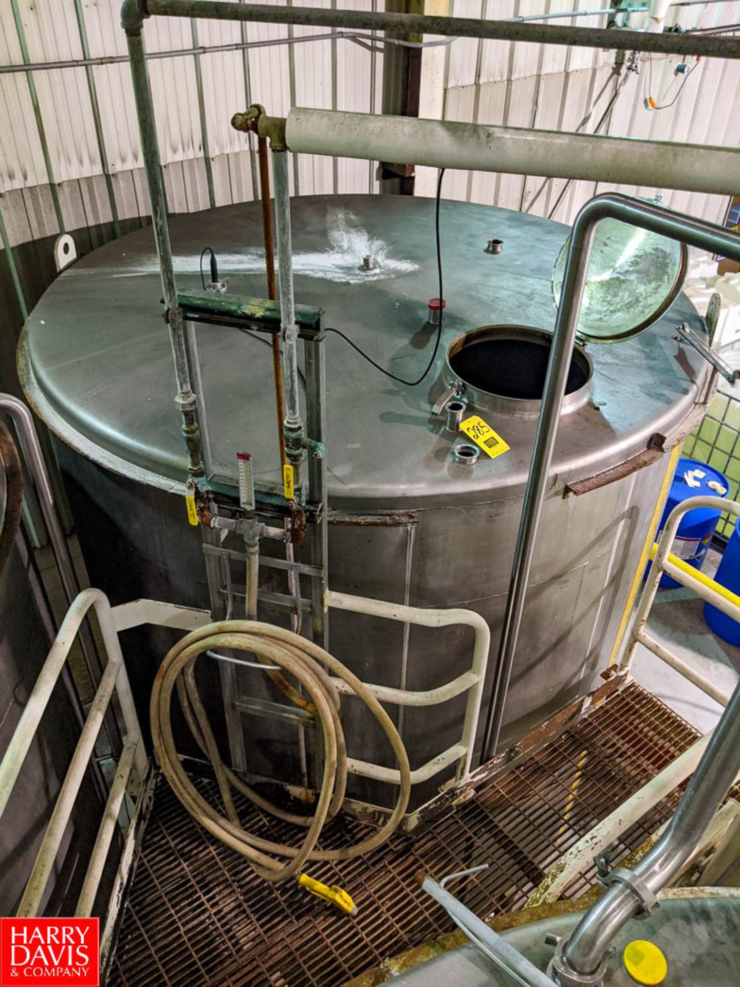 5,000 Gallon S/S Holding Tank with Pump (Loc. Dryer Room) Rigging Fee: $4000