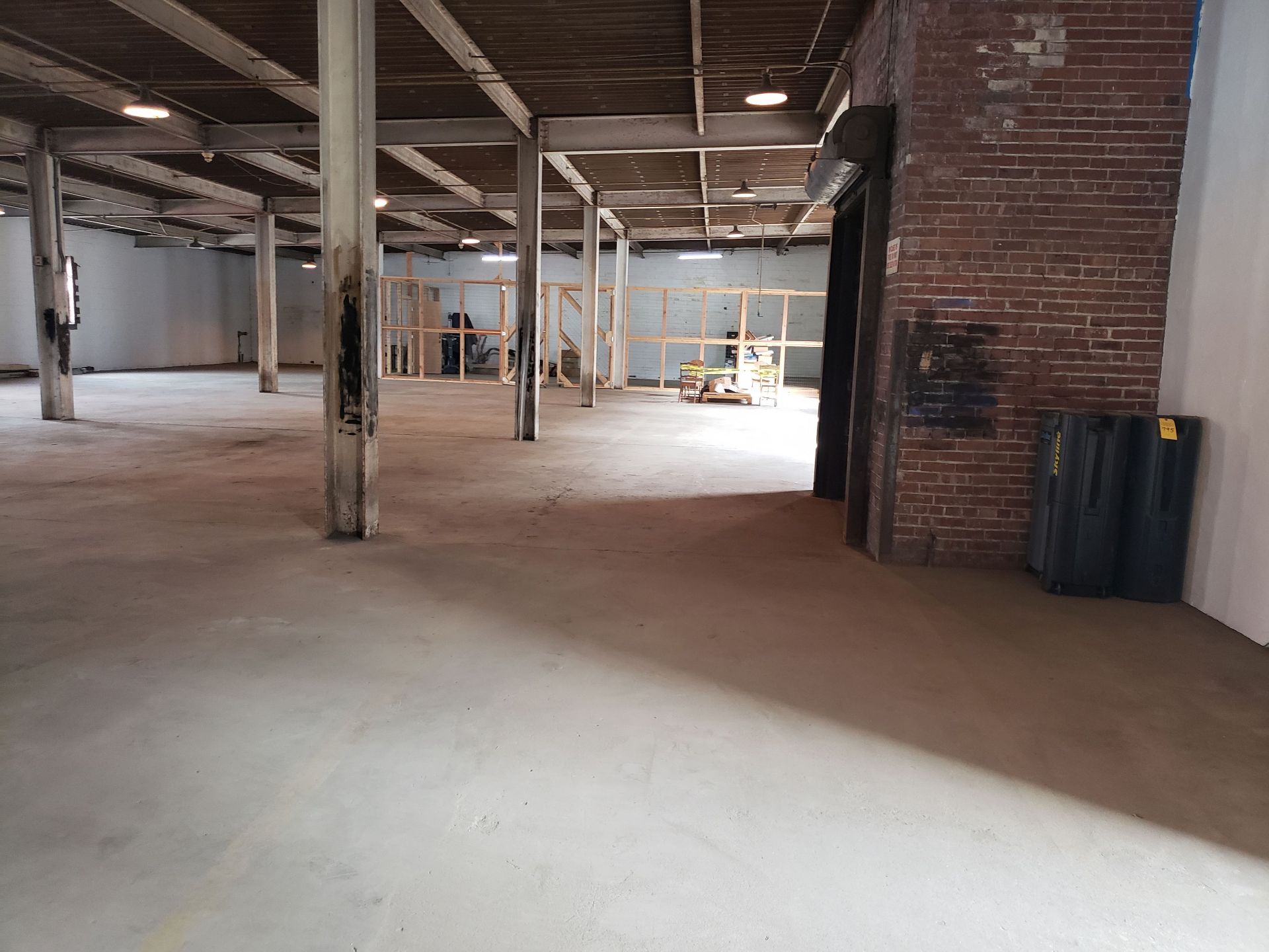 =/- 30,000 SF three story building with truck access, rail runs next to building - Image 51 of 58