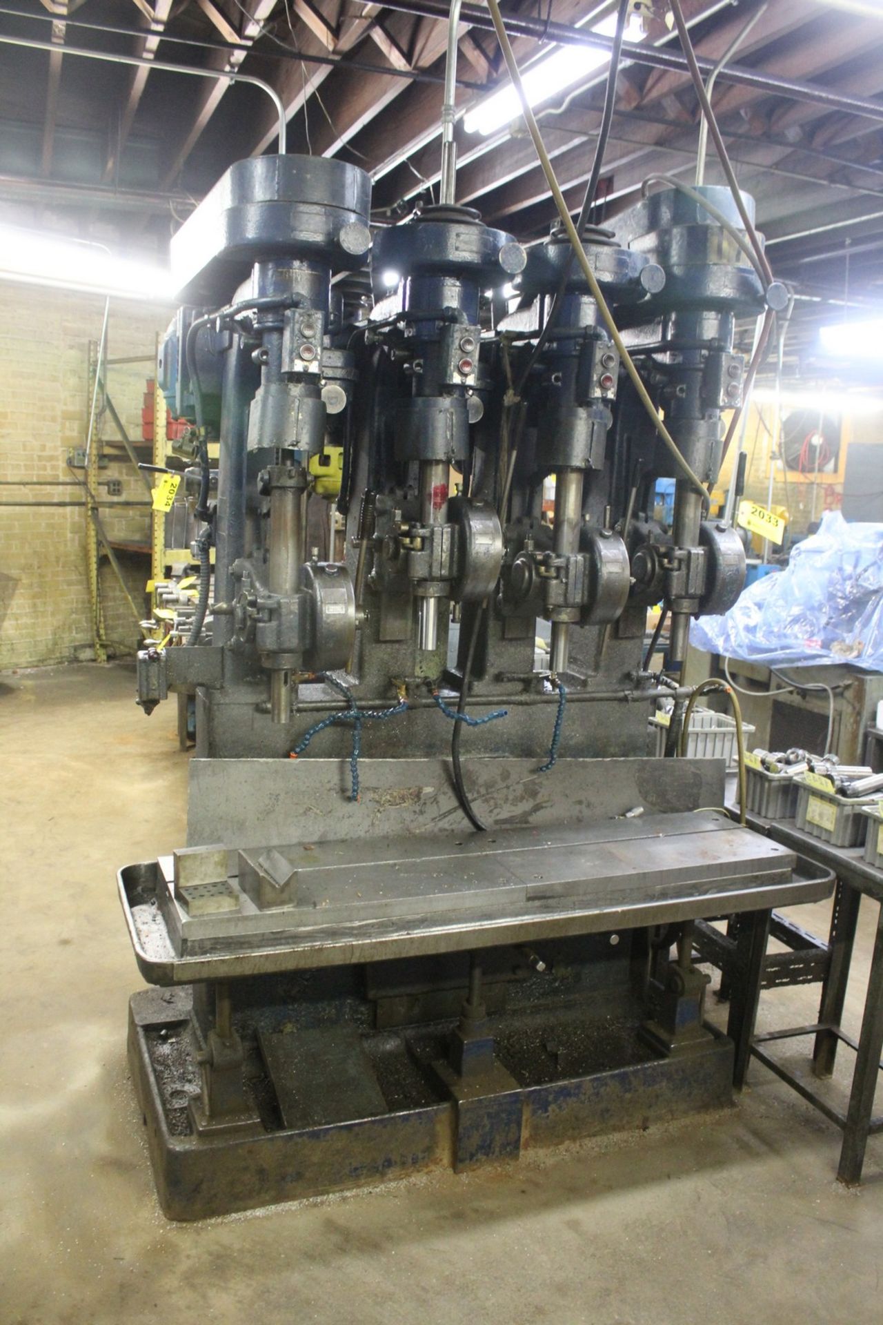 FOUR SPINDLE PRODUCTION DRILL PRESS WITH 73" T SLOTTED TABLE