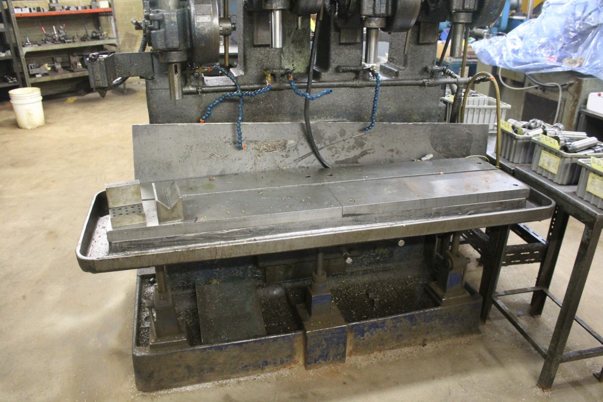 FOUR SPINDLE PRODUCTION DRILL PRESS WITH 73" T SLOTTED TABLE - Image 4 of 4