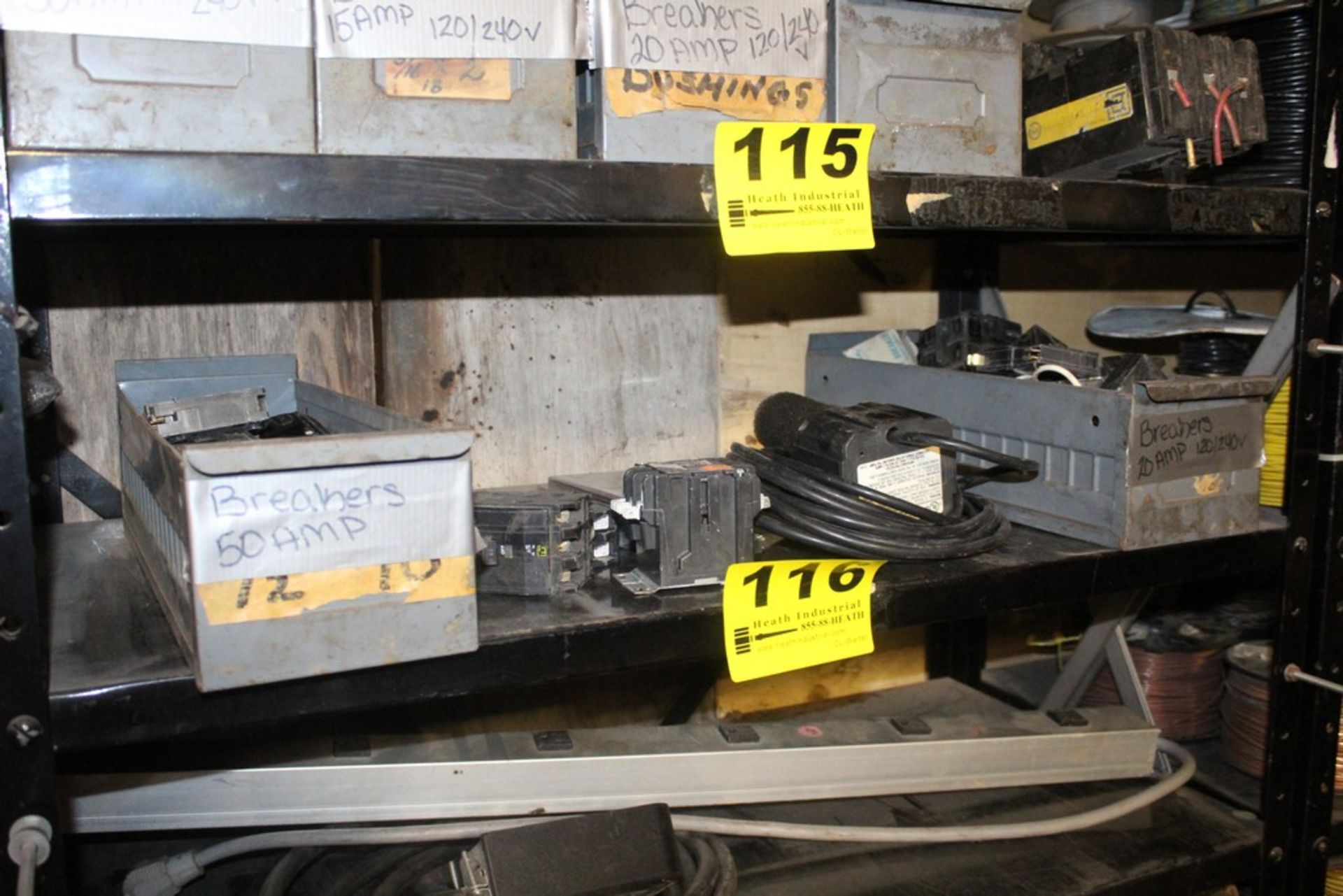 ASSORTED CIRCUIT BREAKERS ON SHELF